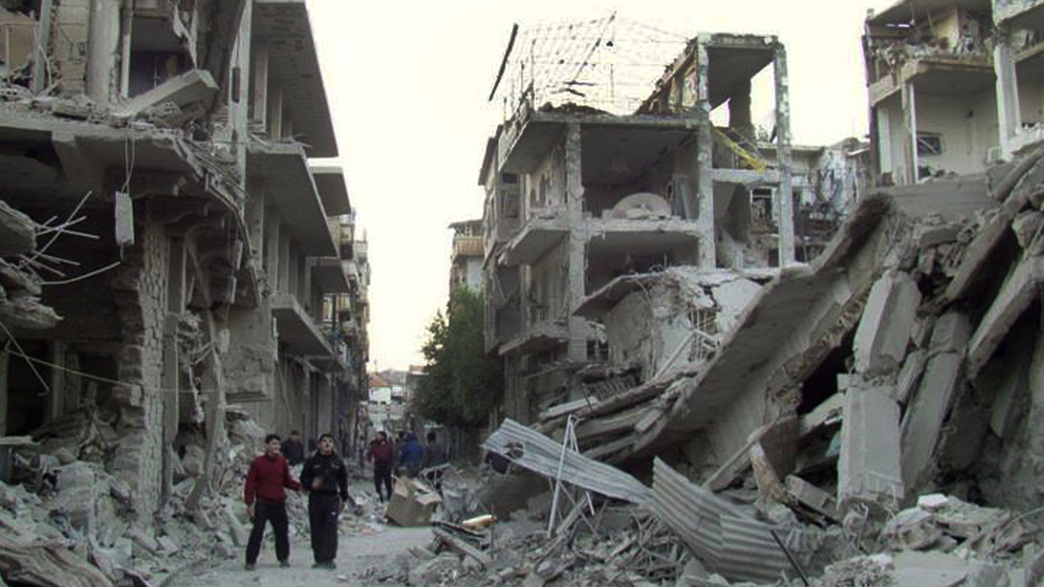 Residents of Syrian city of Homs surrounded by rubble