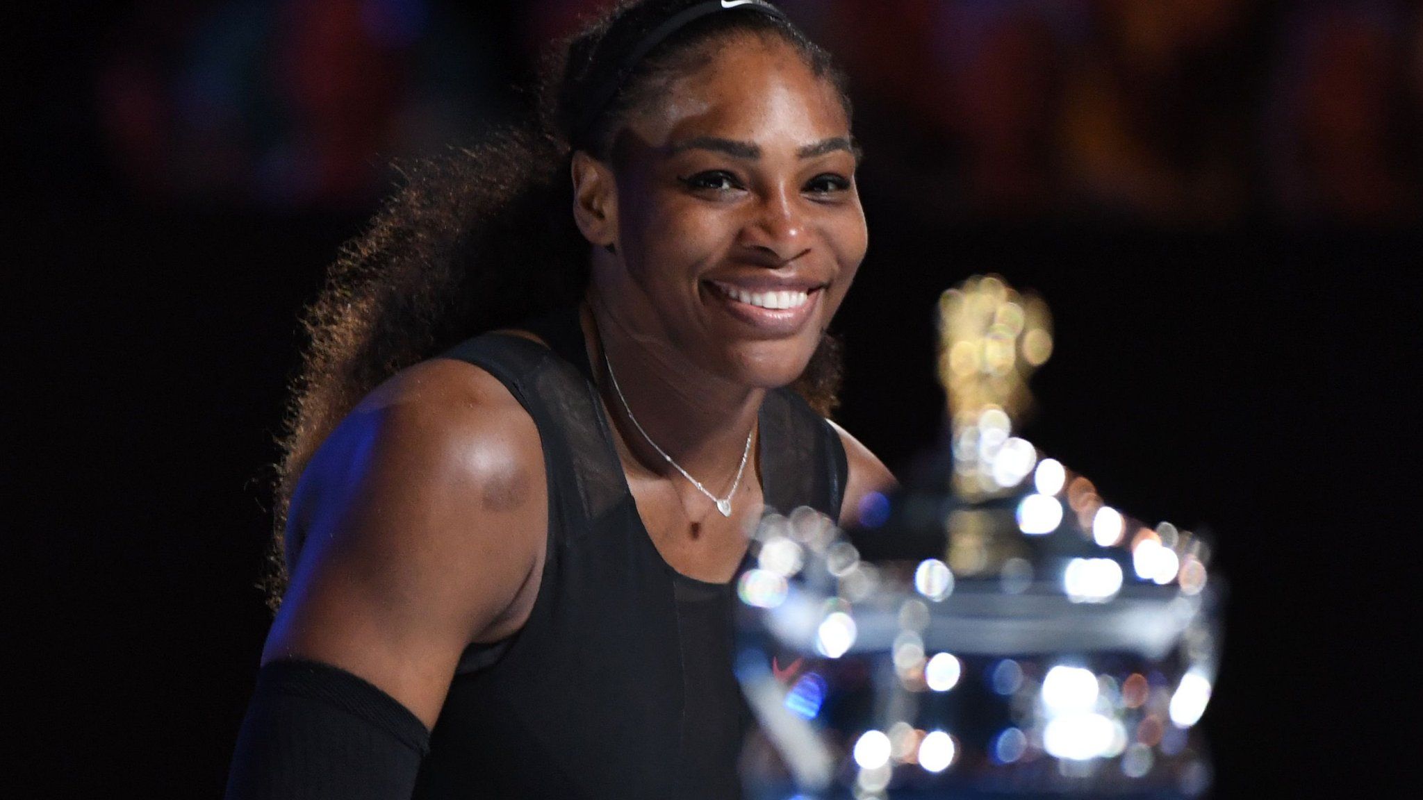 Serena Williams celebrates her win over Venus Williams