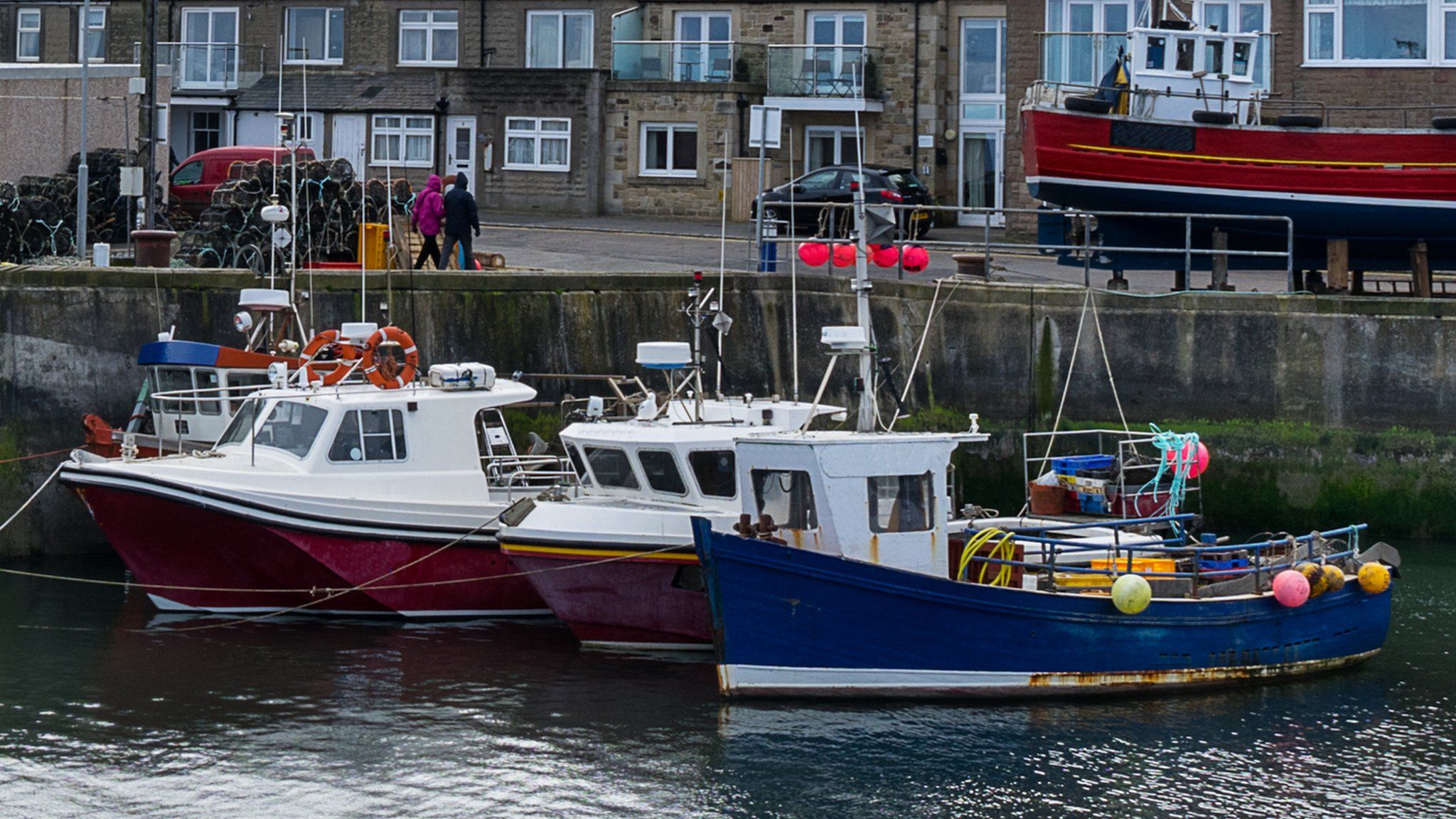 View of boats in the harbour at Seahouses