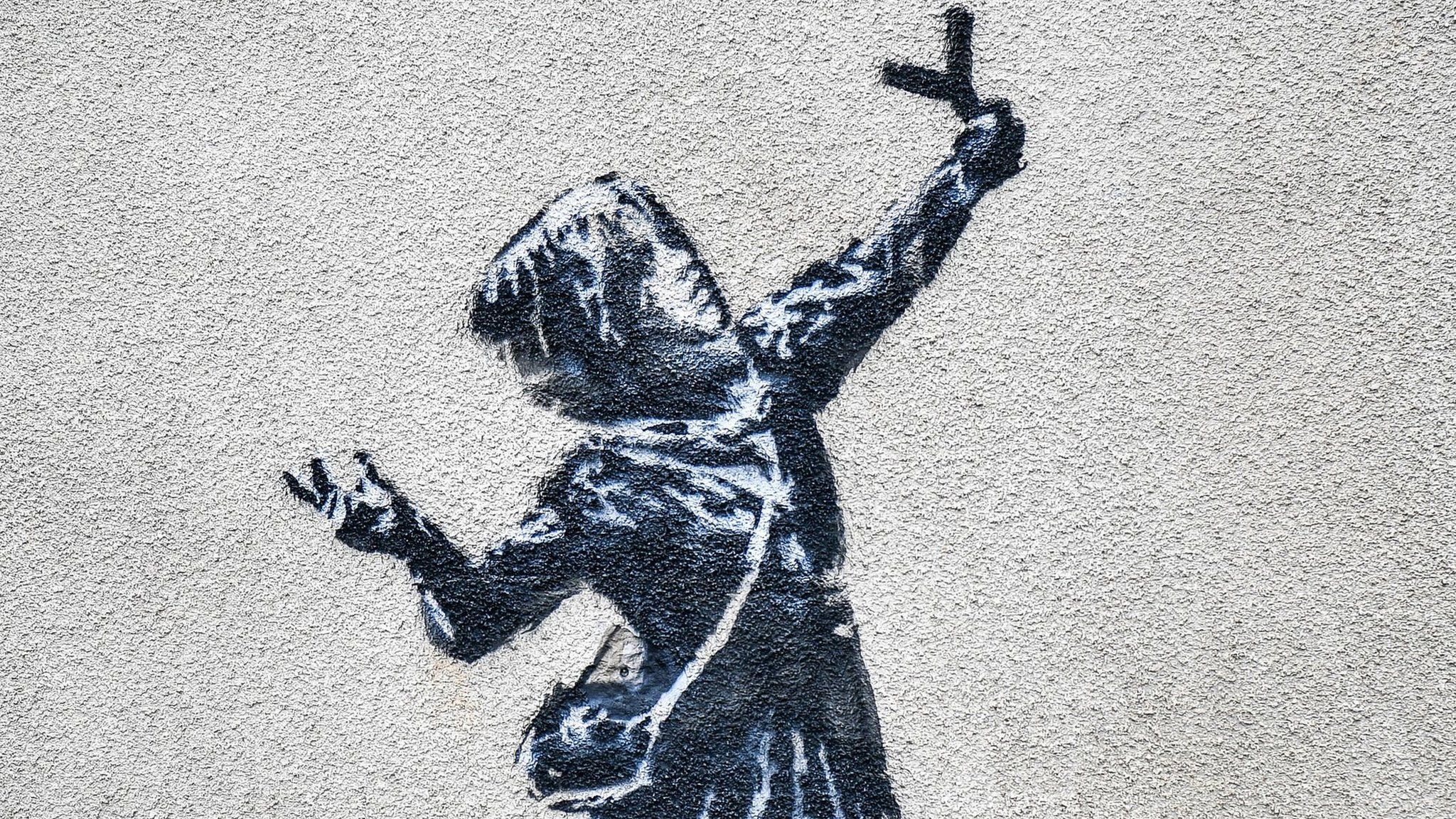 Banksy's girl with a slingshot