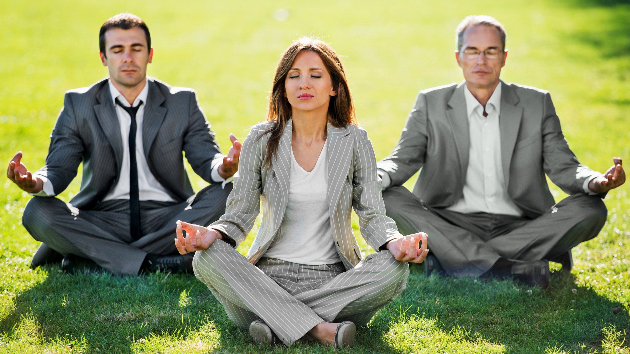 business people meditating