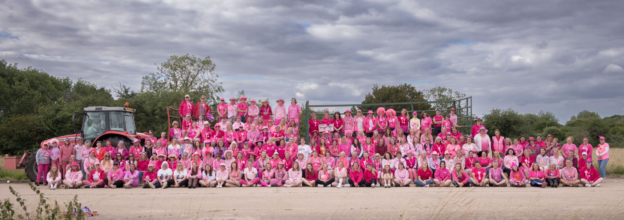 Group shot of Pink Ladies Tractor Run drivers
