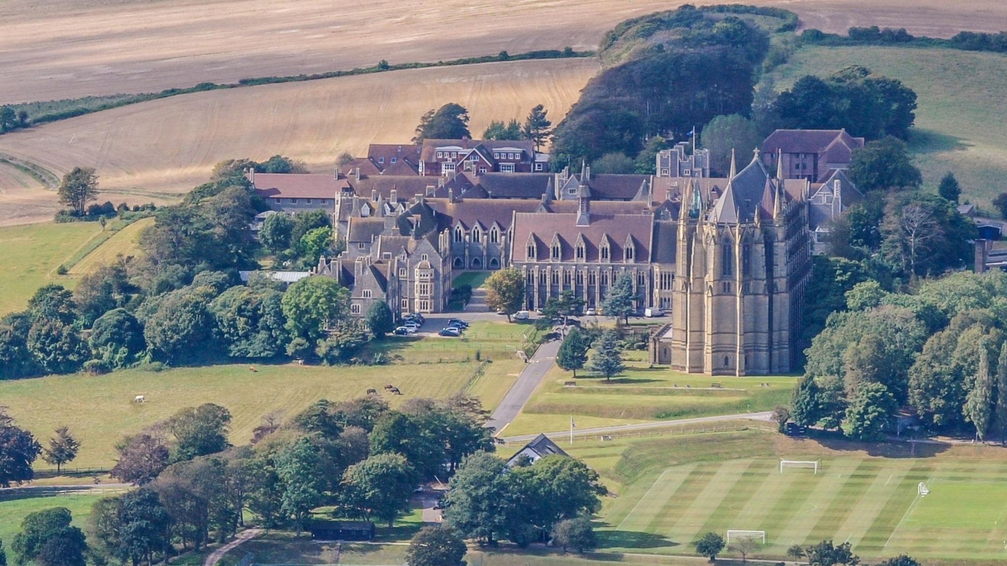 Lancing College, a grand old building stands in large green grounds