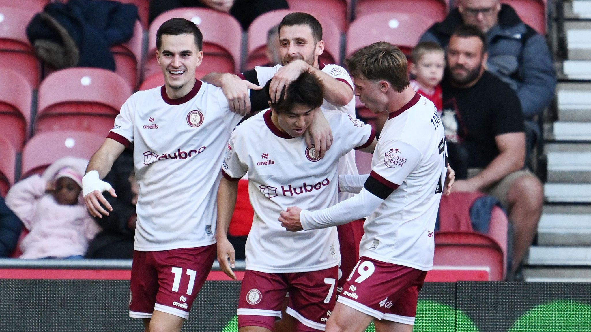 Yu Hirakawa celebrates scoring his first goal for Bristol City, surrounded by team-mates