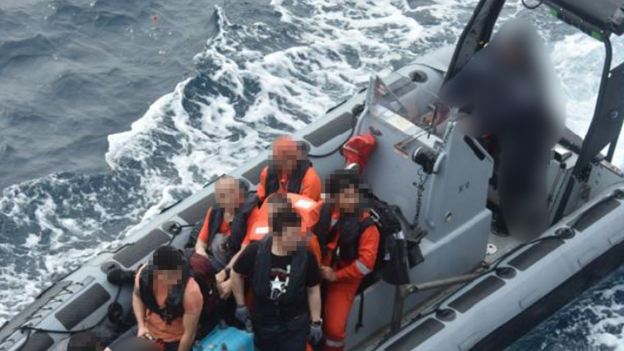 EUNAVFOR handout showing the crew of the Greek-flagged tanker Sounion being rescued by a warship in the Red Sea (21 August 2024)