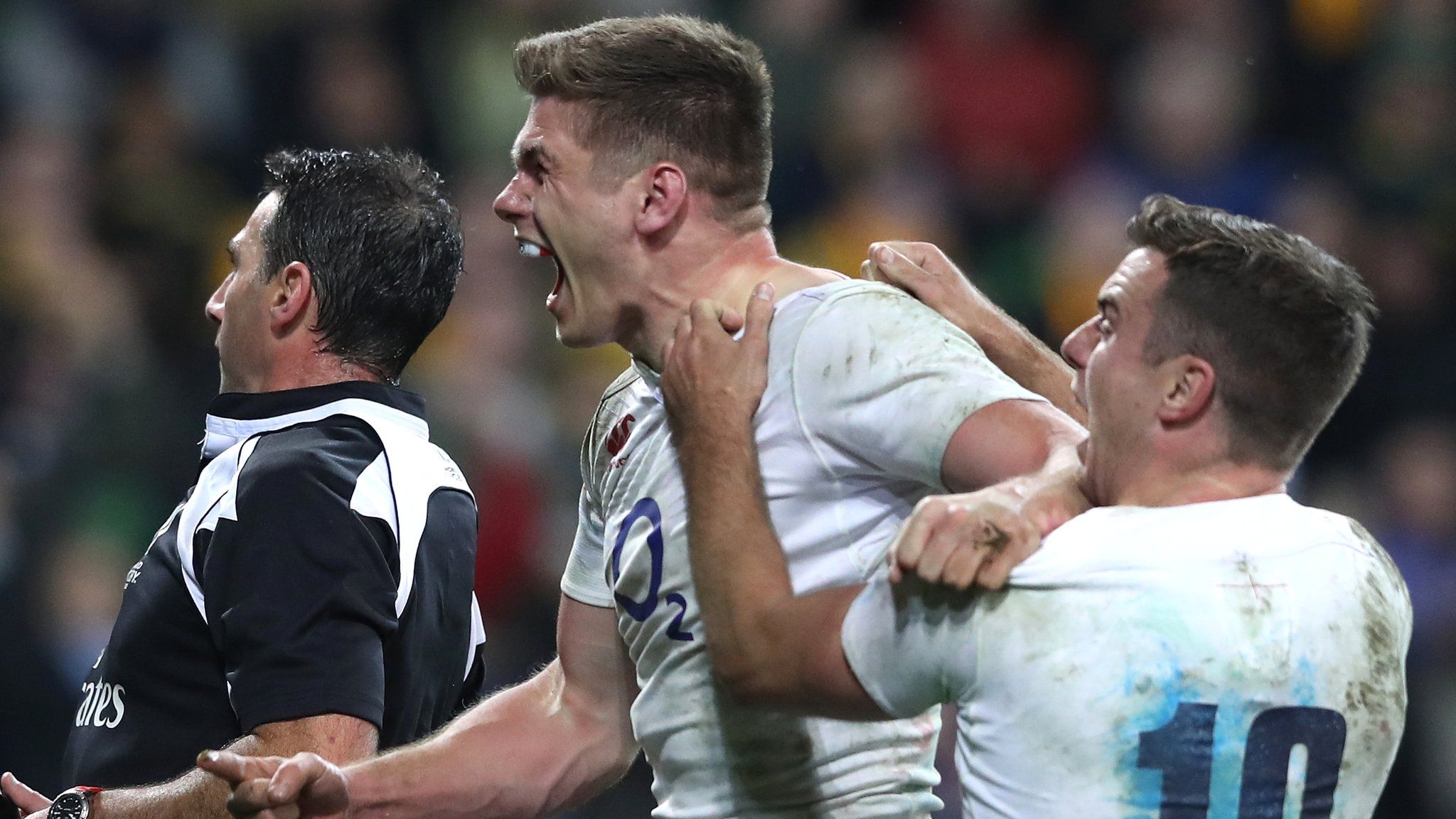 Owen Farrell celebrates his try with help from George Ford