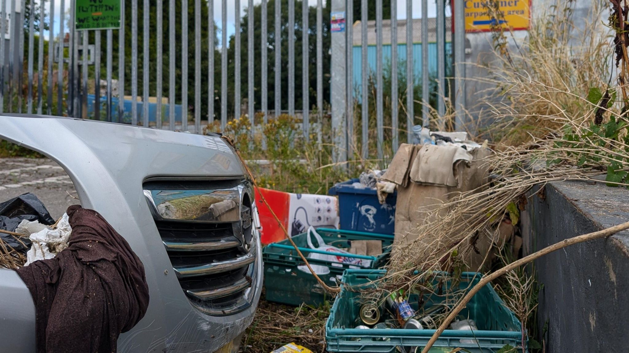 Some of the waste dumped in alleyways off Portland Street and Rutland Street in Cobridge, including a car bumper, boxes and empty beer cans.