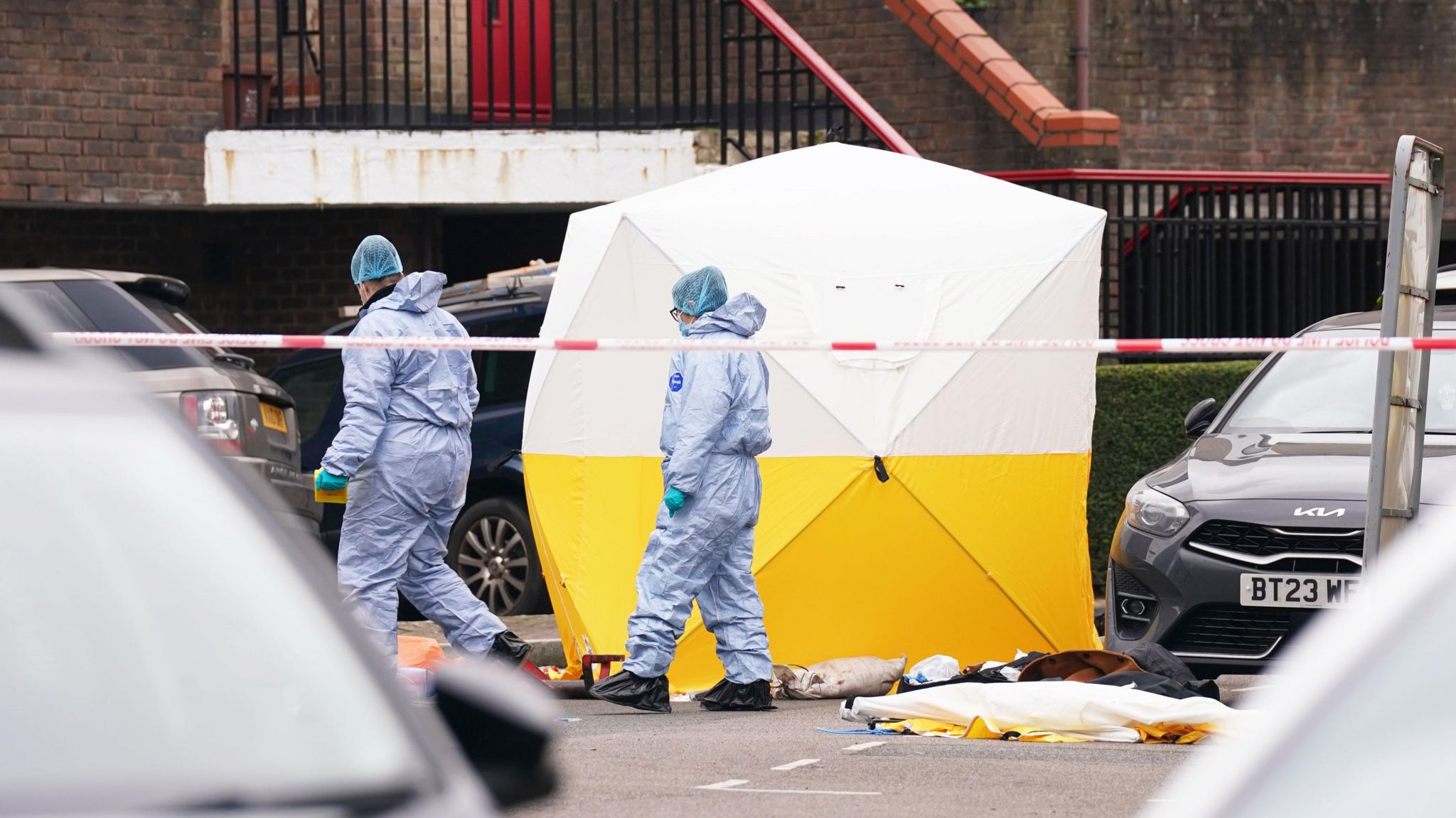 Police forensic officers at the scene near Bywater Place