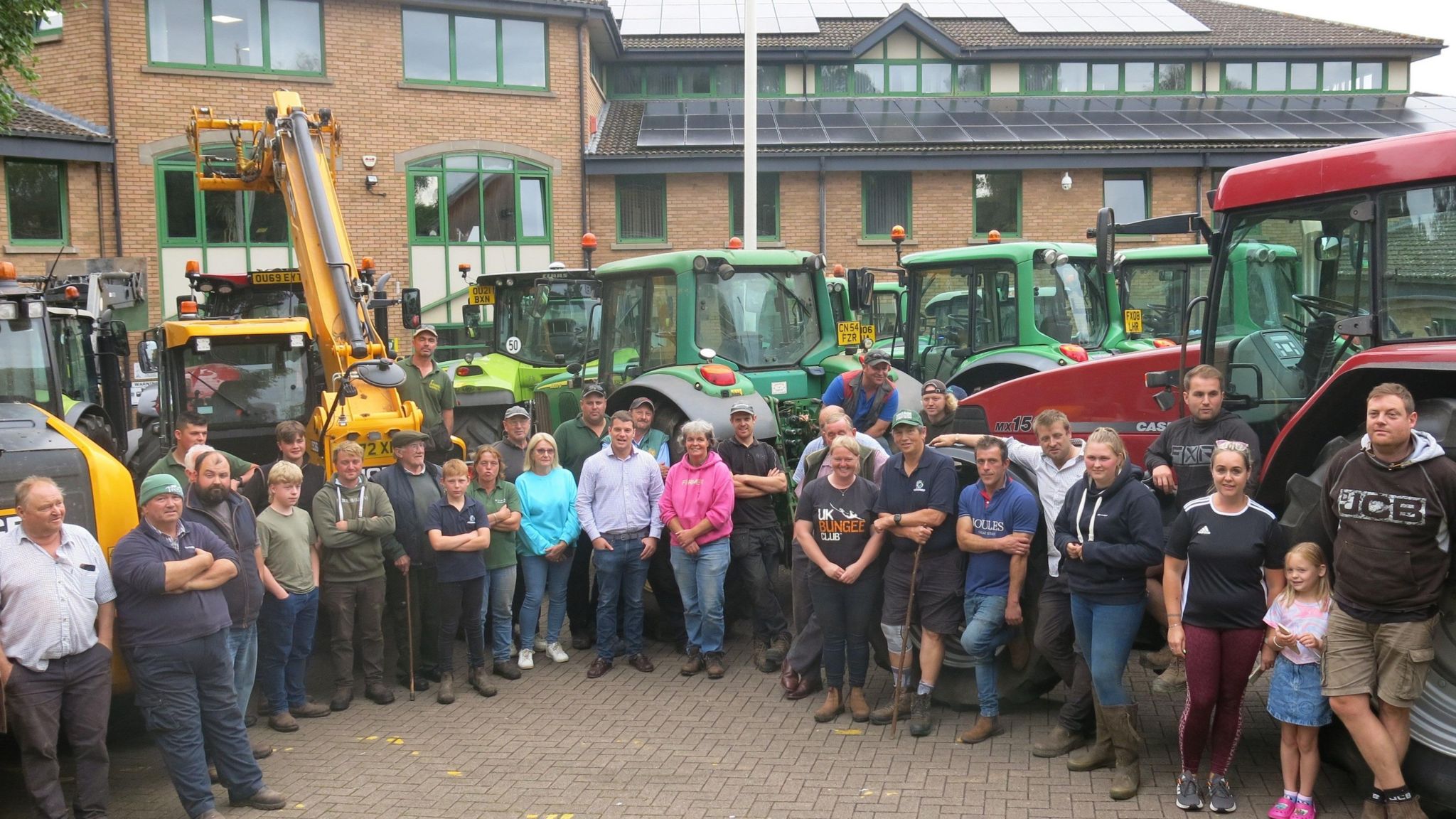 Farmers stood by their tractors at the Forest of Dean District Council offices in Coleford