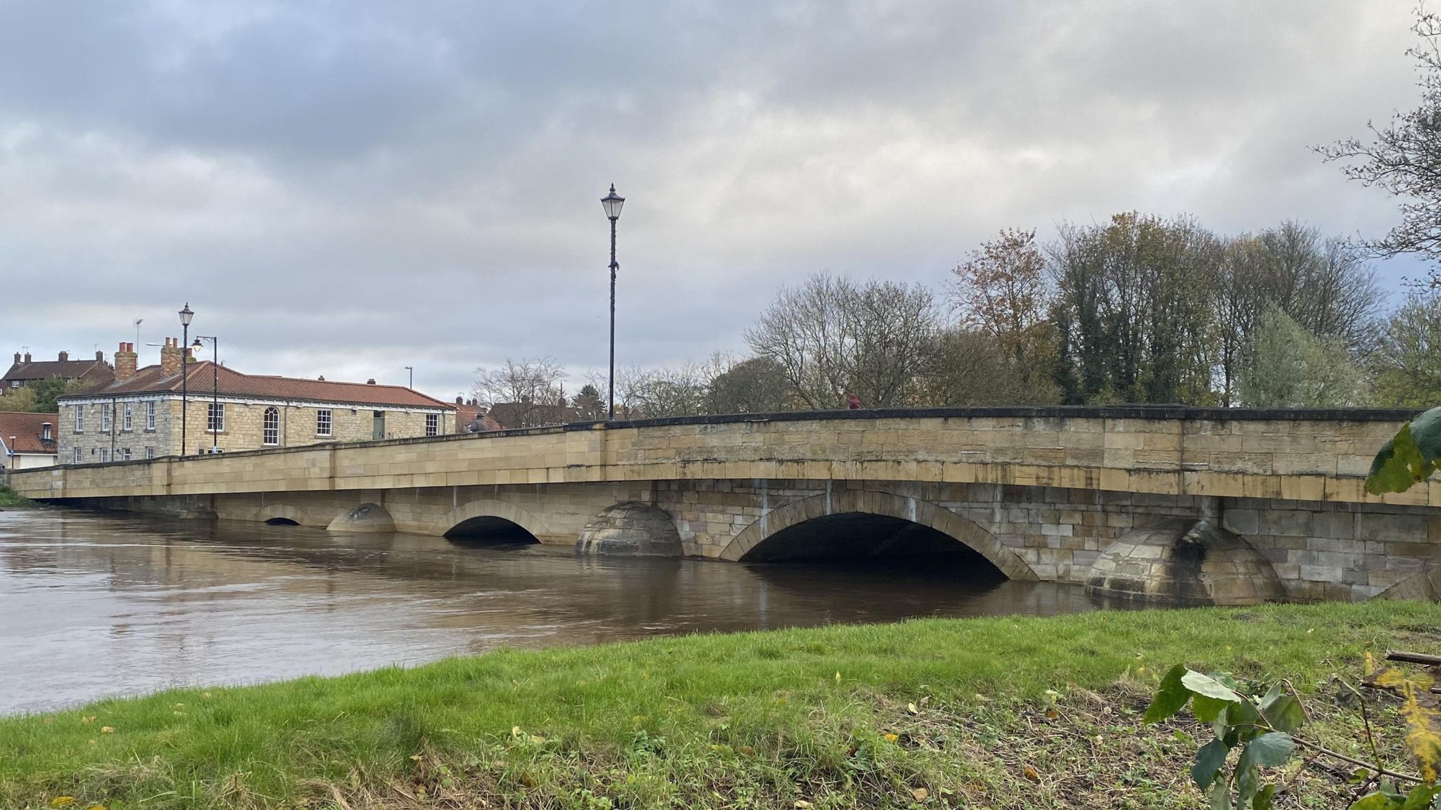 Tadcaster Bridge with river levels high underneath