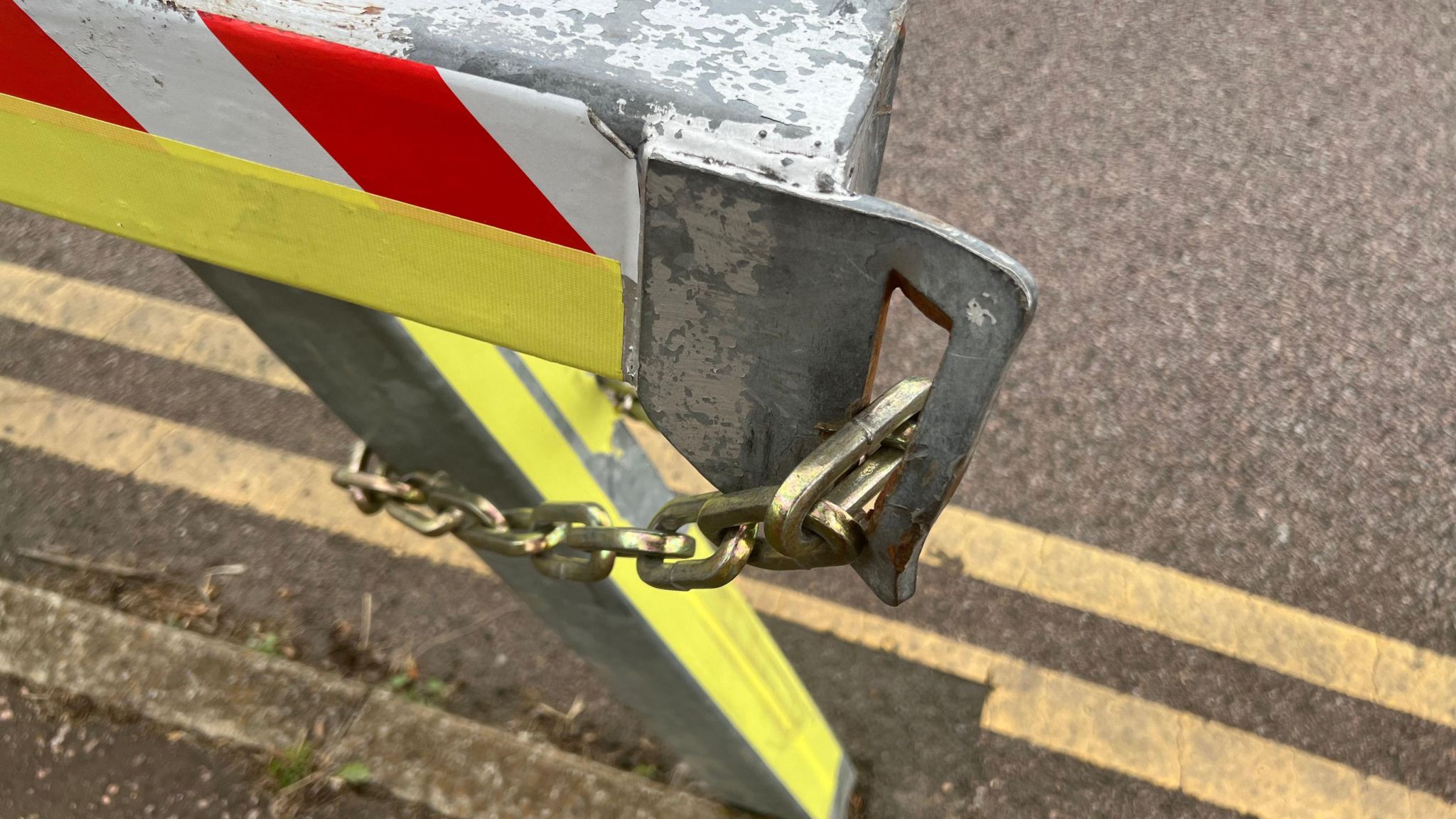 A close-up of the lock on a gate