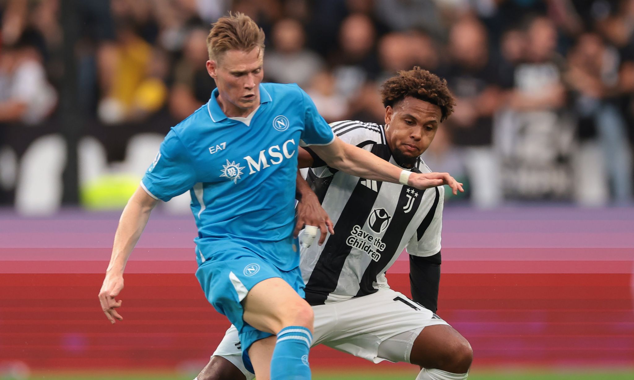 Napoli's Scott McTominay holds off a challenge from Weston McKennie of Juventus during their 0-0 draw