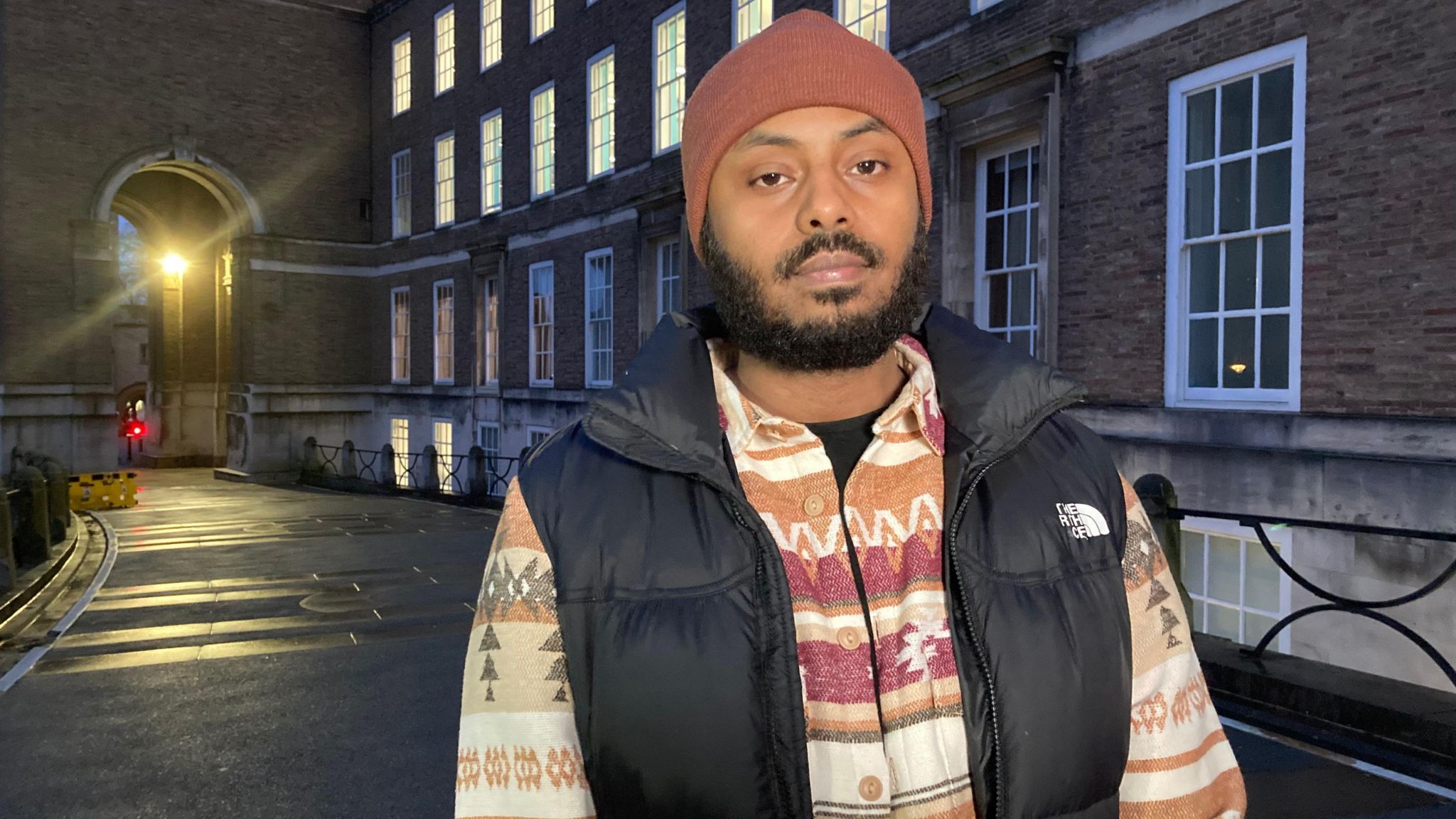 Mr Shaban Ali standing outside the main council building in Bristol 