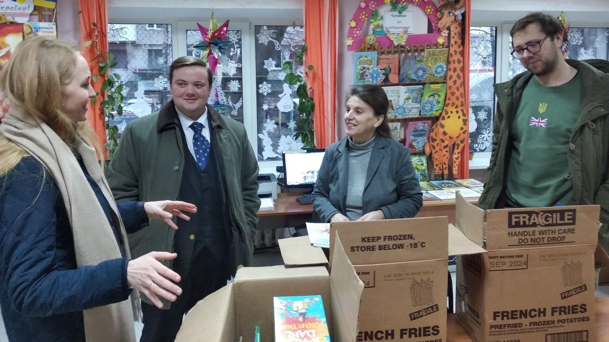 Jordan Meade delivers a consignment of children's books to Ukraine