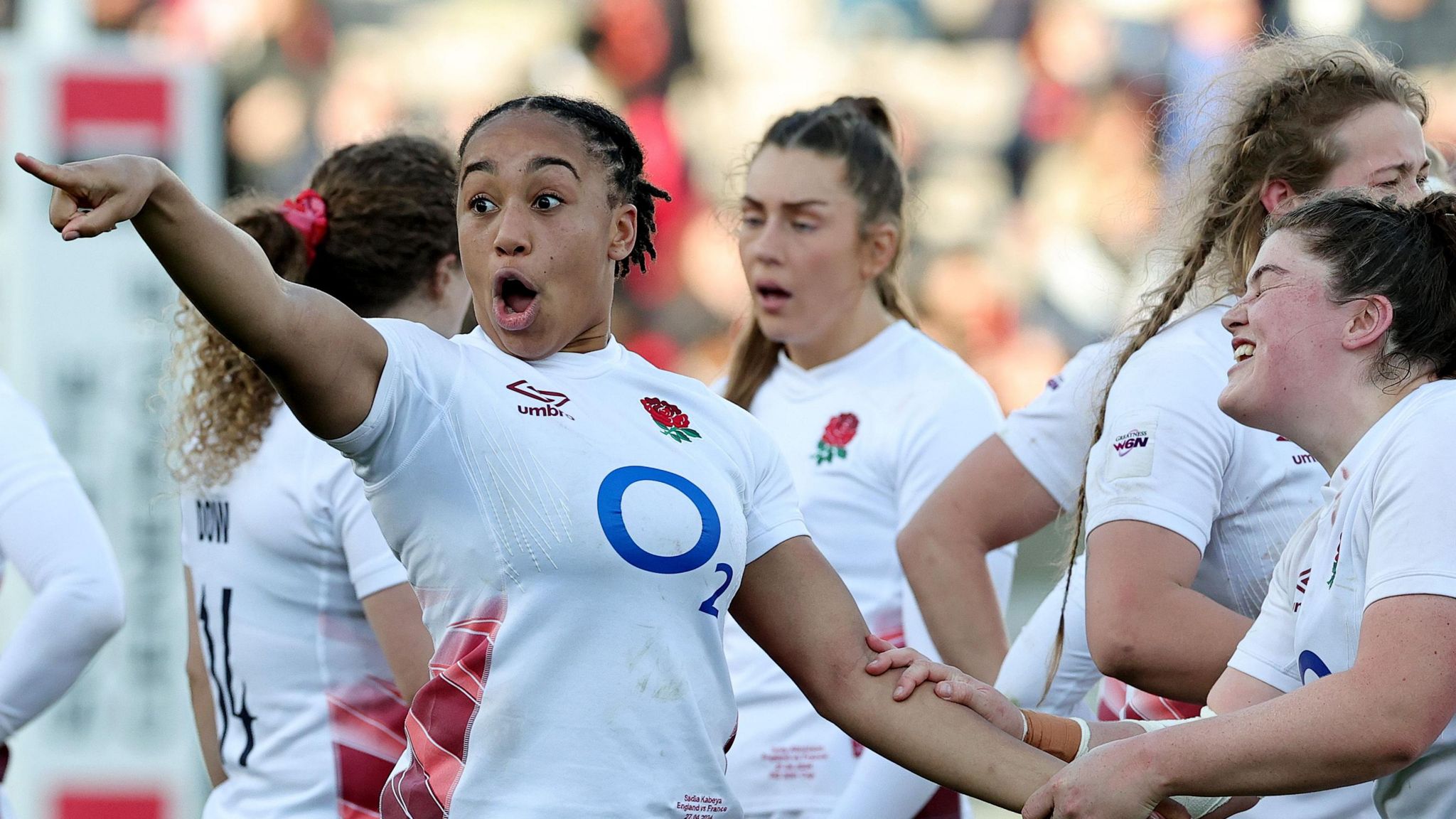 Sadia Kabeya points and shouts while in action for England