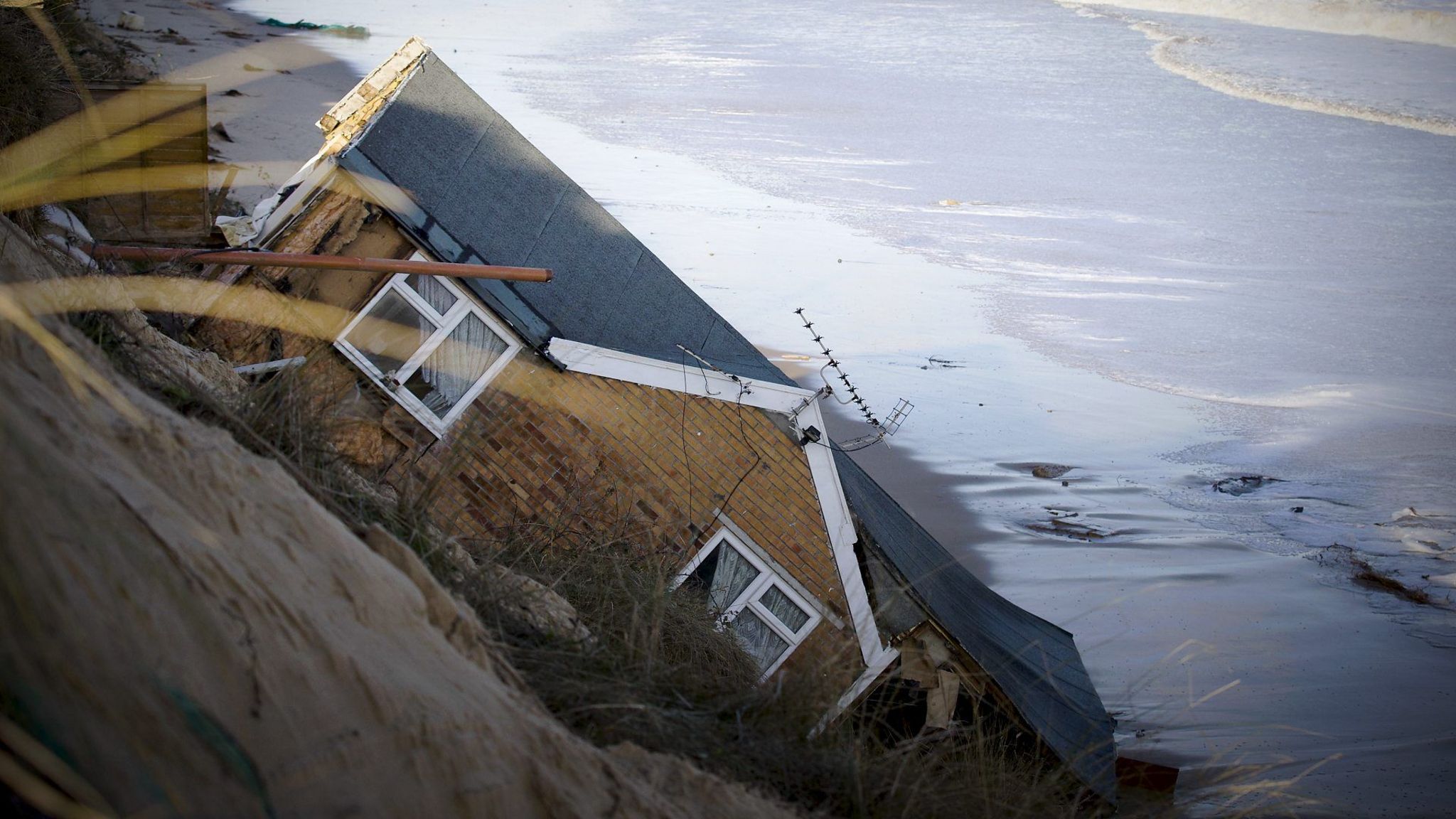 Property falls into the sea at Hemsby in Norfolk