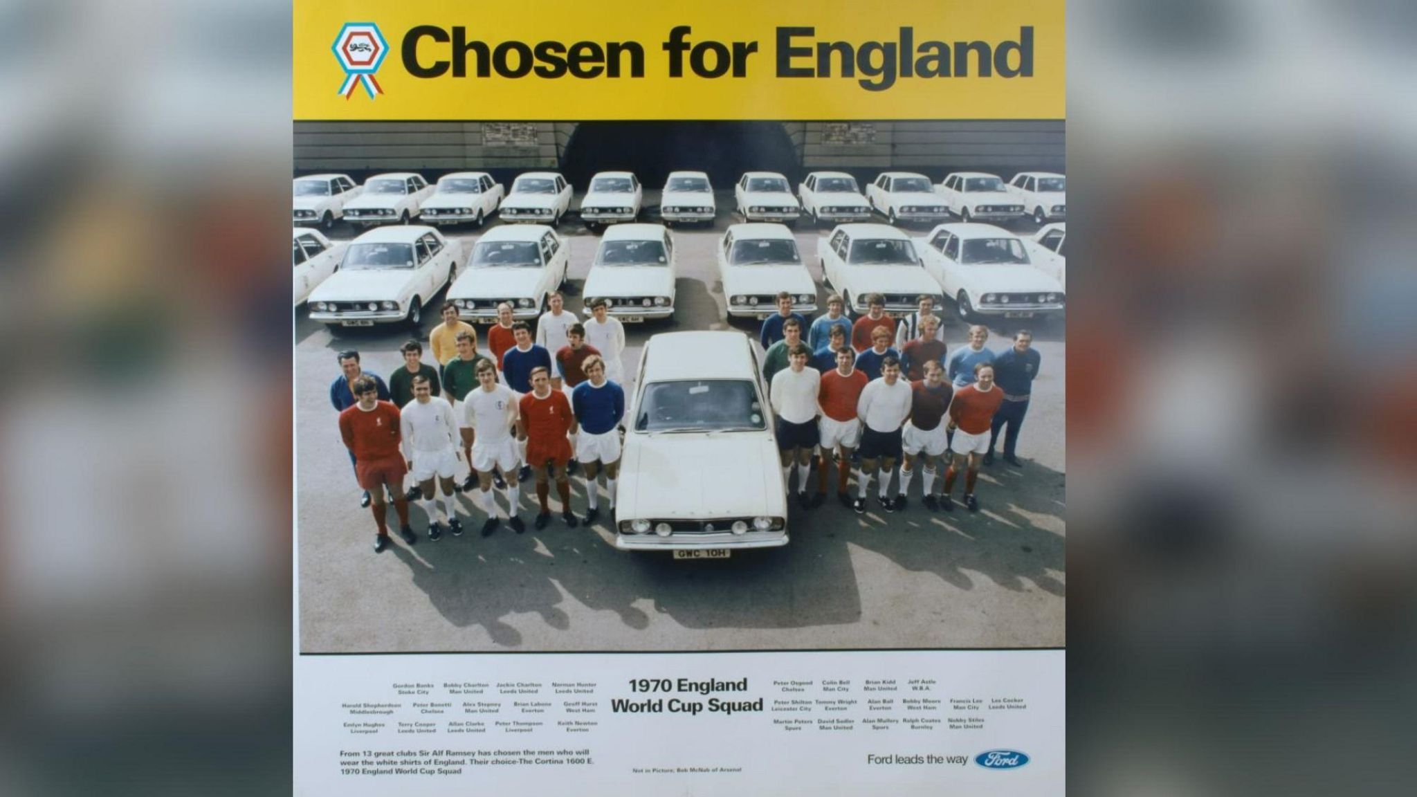 The 1970 England World Cup squad lined up in front of the Ford Cortinas they were presented with, in a Ford advert which says 'Chosen for England'