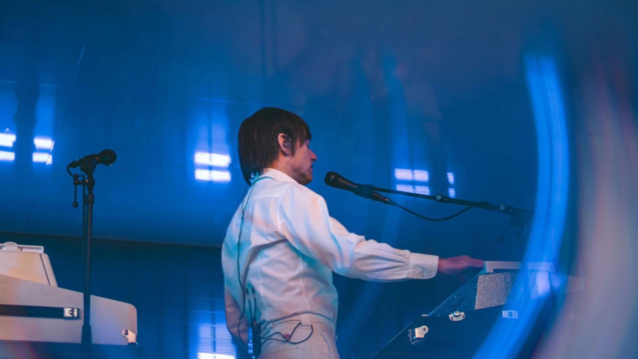 French music duo, Air, playing a keyboard on stage