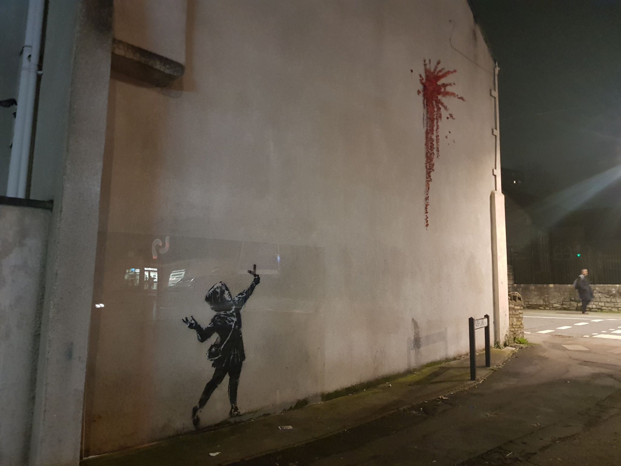 Plastic screen on Banksy artwork