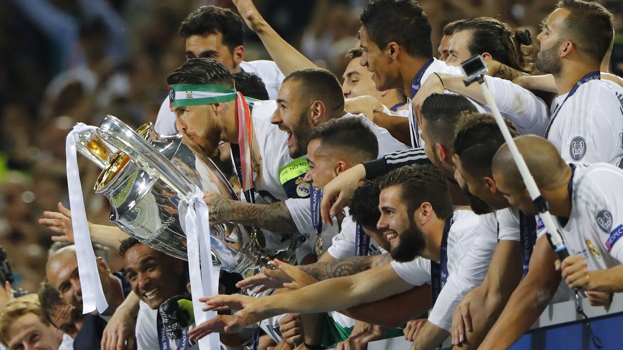 Sergio Ramos celebrates with the trophy