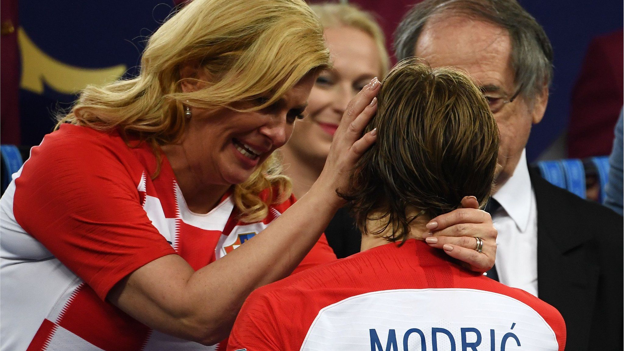 Croatia president Kolinda Grabar-Kitarovic embraces Luka Modric after the World Cup final