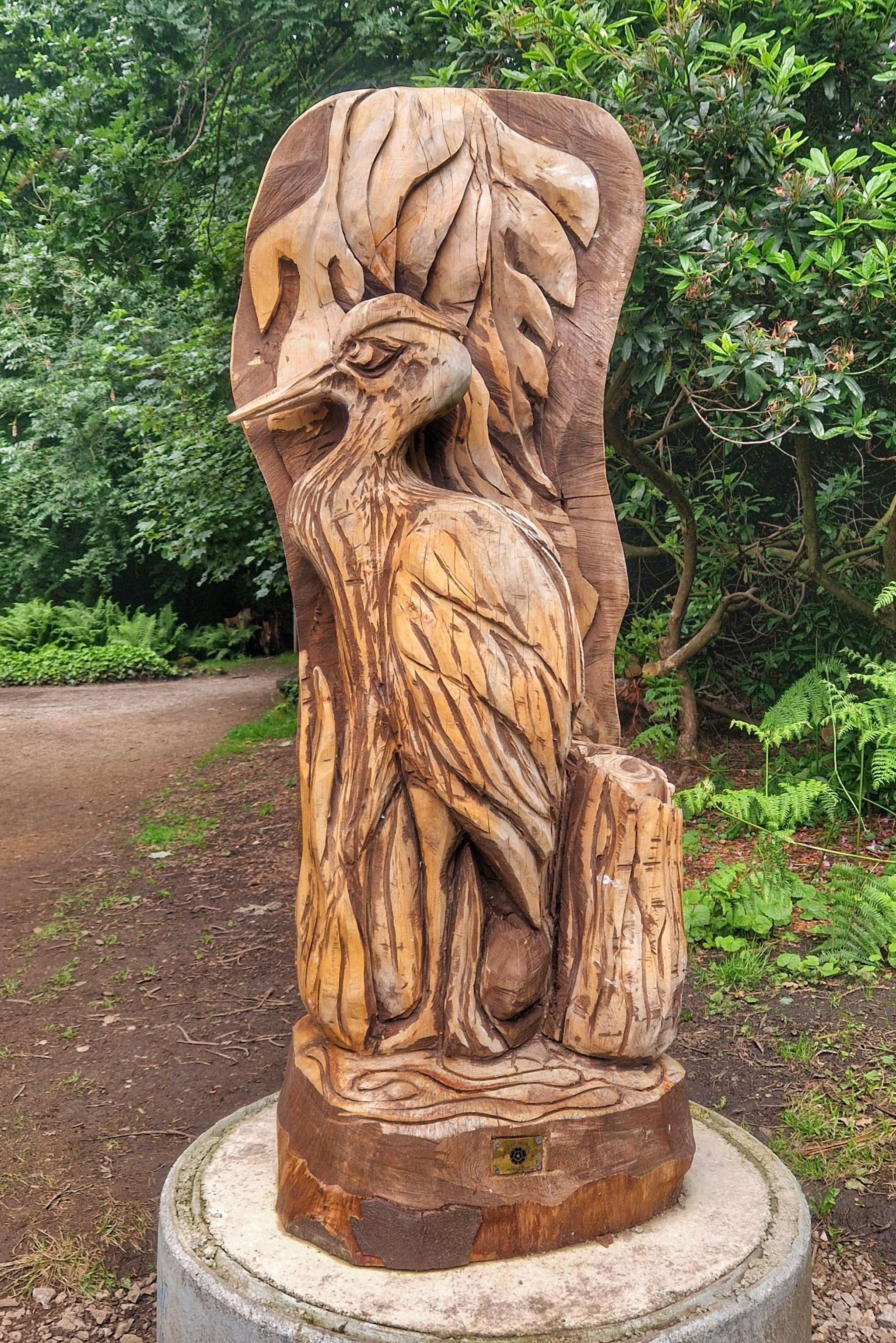 A sculpture of a heron