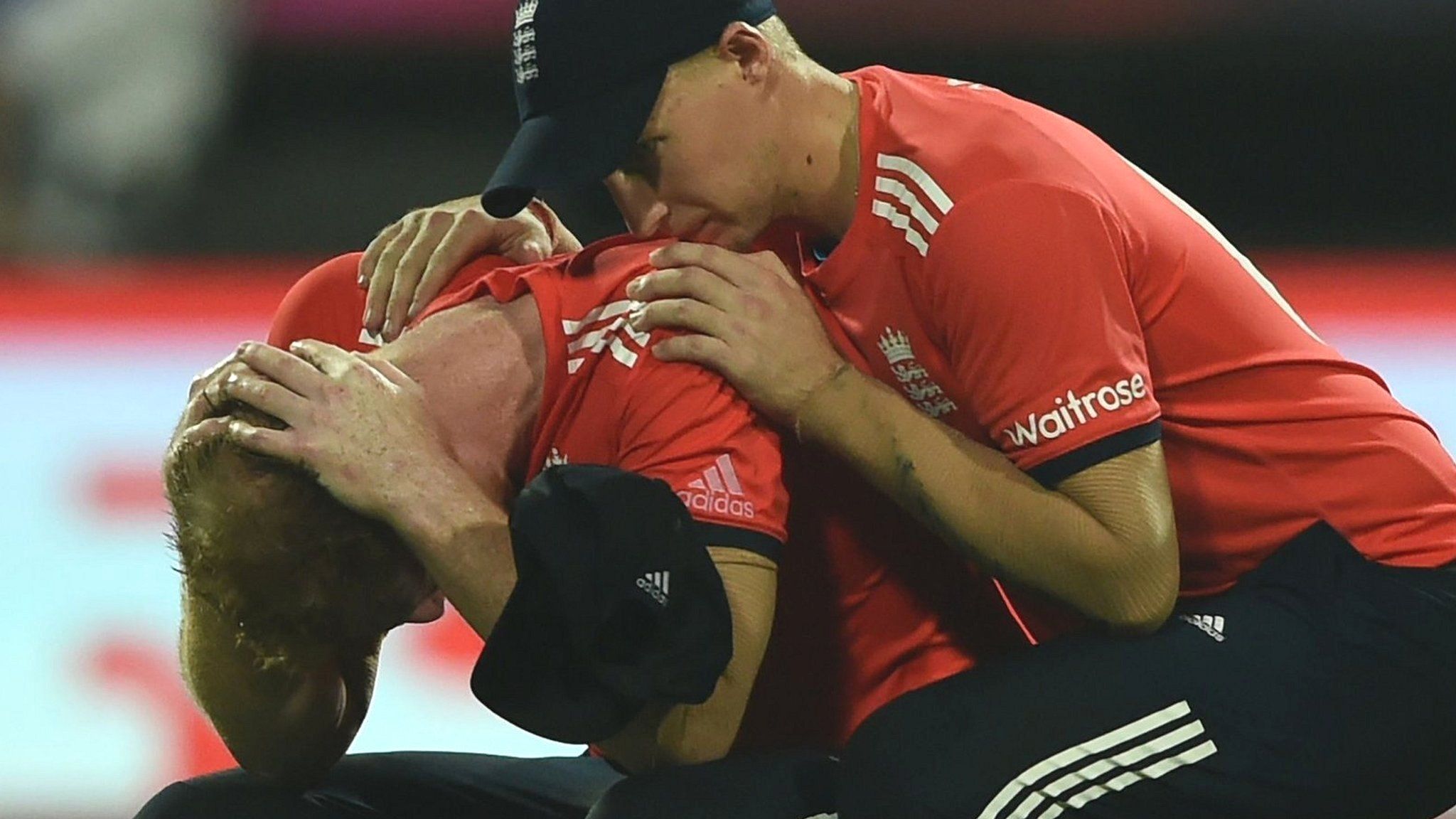 Ben Stokes is consoled by Joe Root