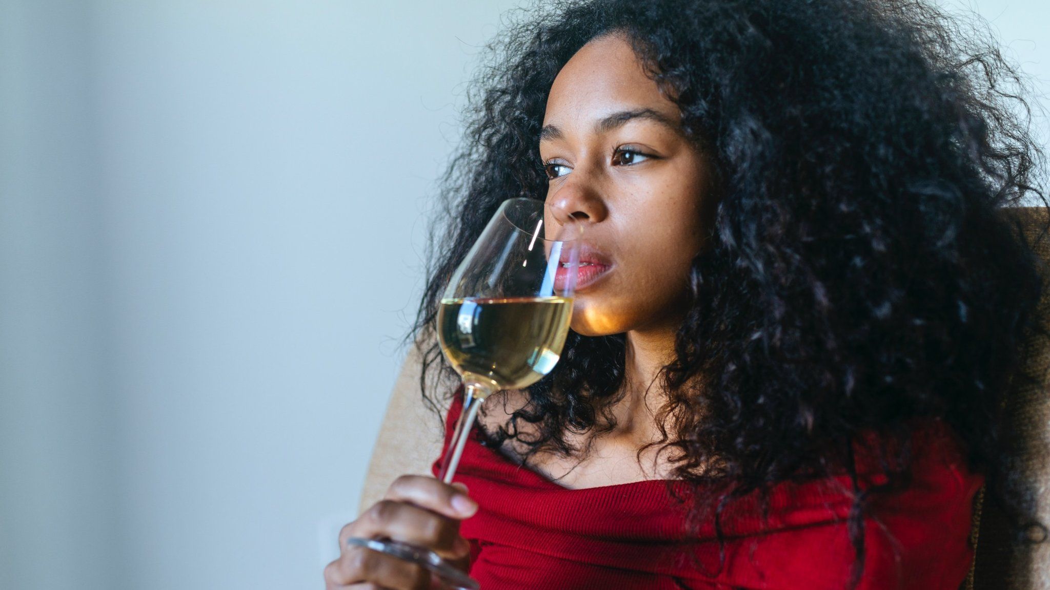 Stock image of woman drinking wine