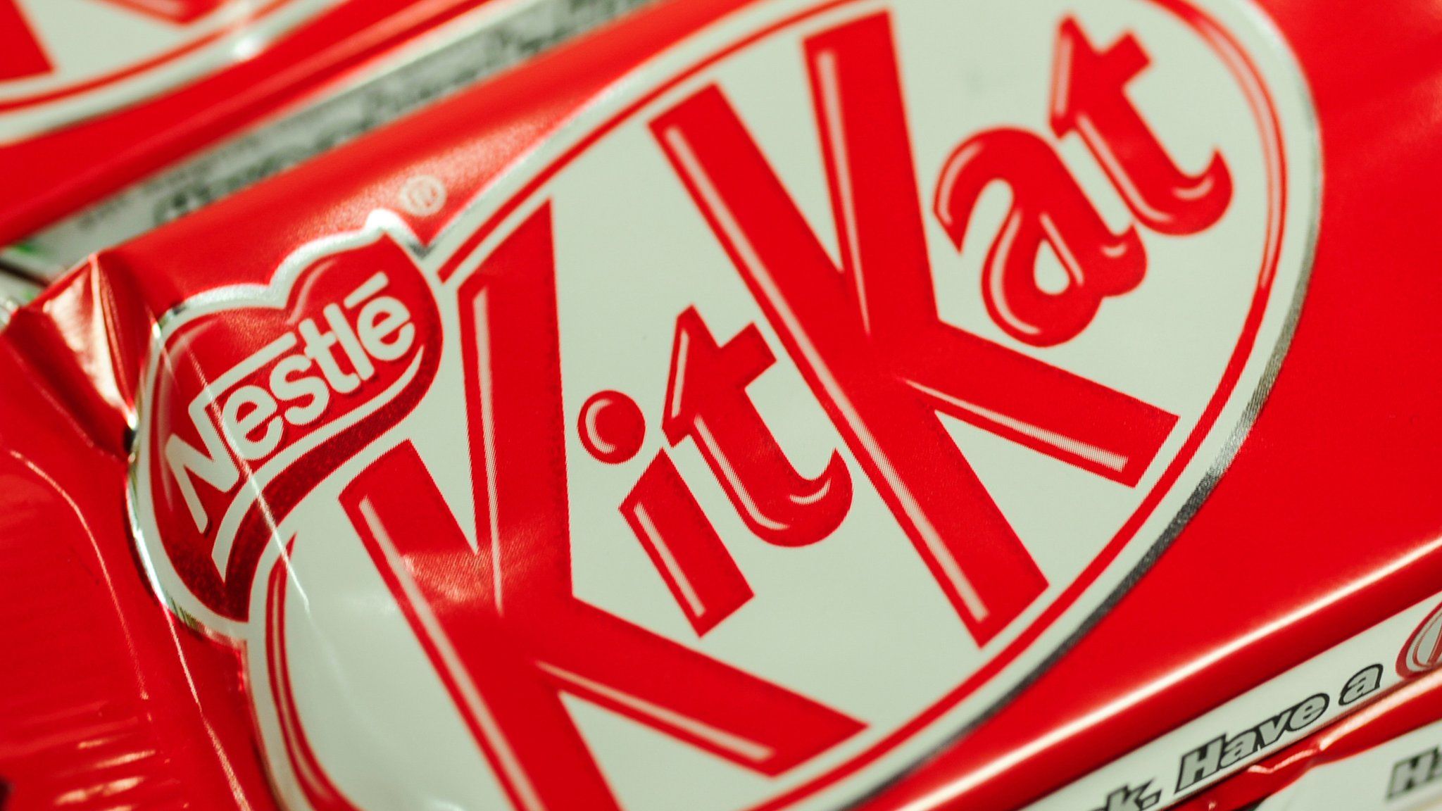 A close-up of a KitKar bar in its wrapper