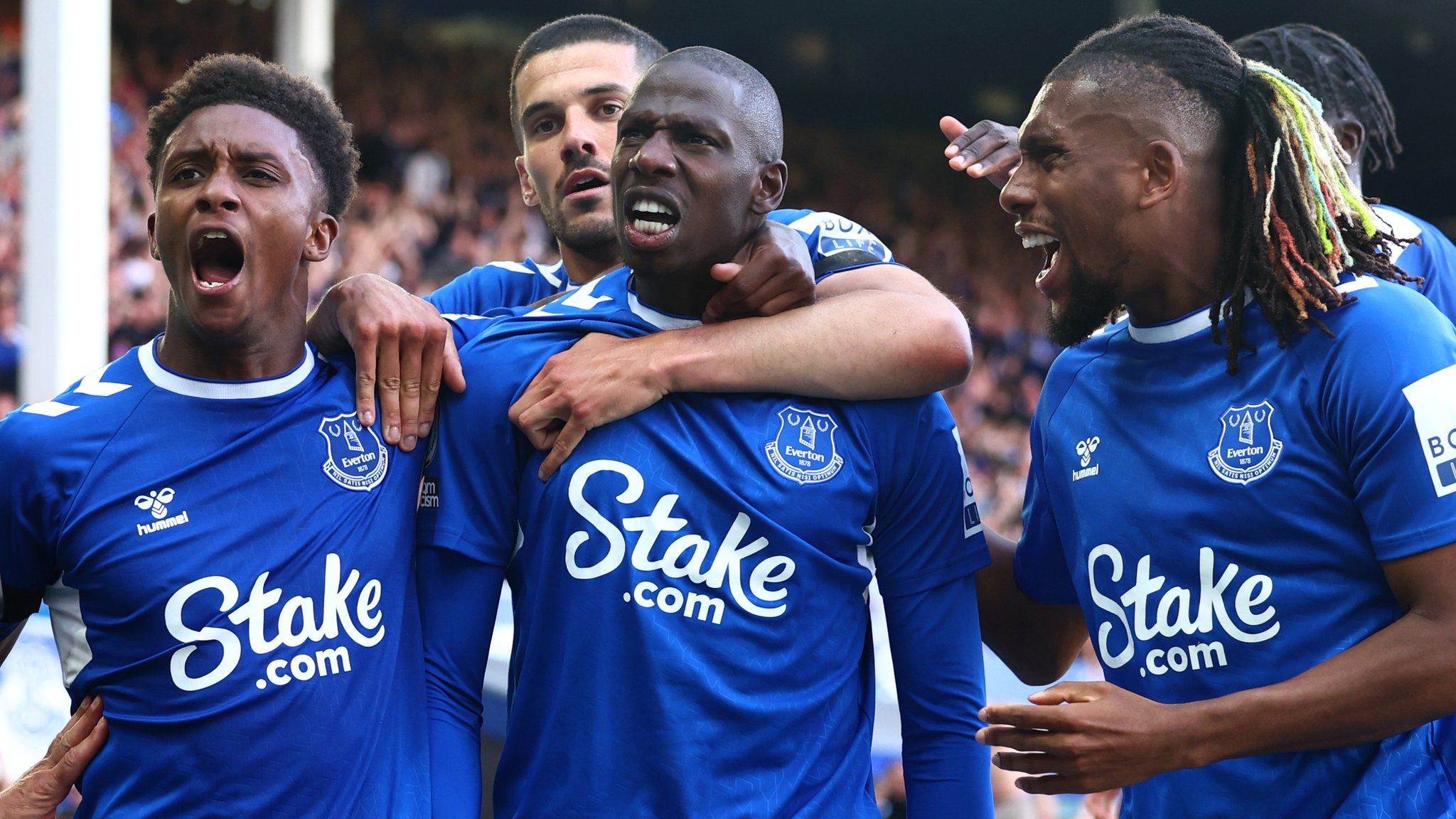 Everton players celebrate towards the end of the 2022-23 season
