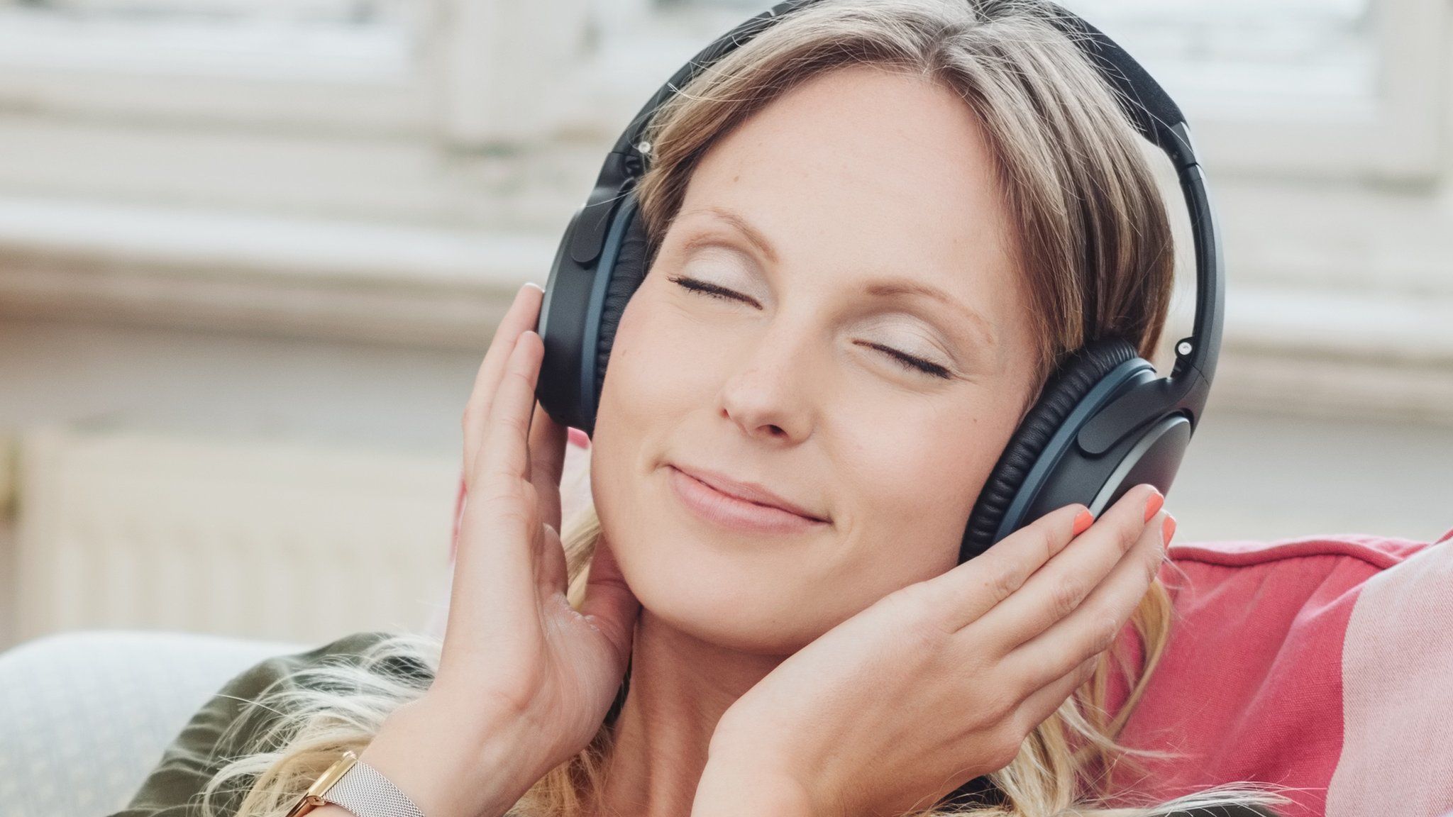 A woman listening to music