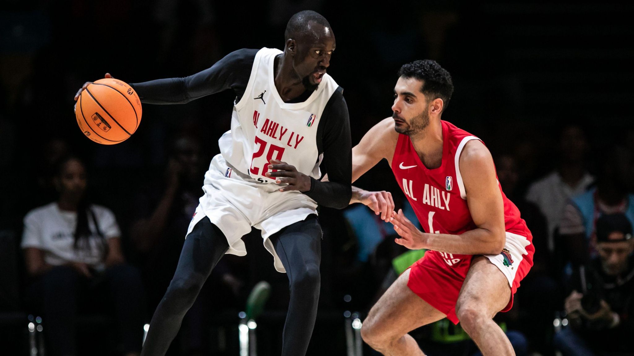 Majok Deng of Al Ahly Libya handles the ball during a BAL game against Al Ahly 