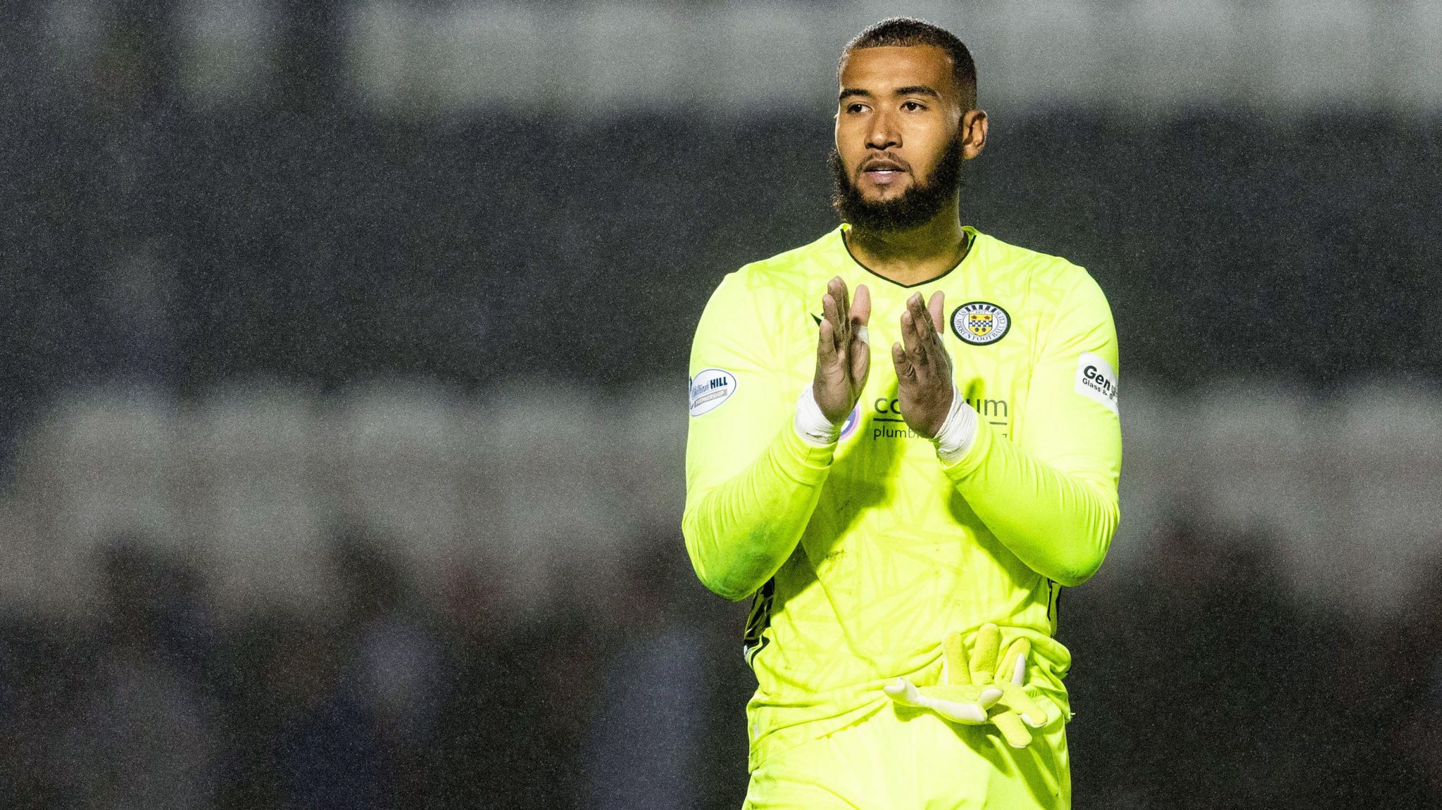 Ellery Balcombe applauds the St Mirren fans