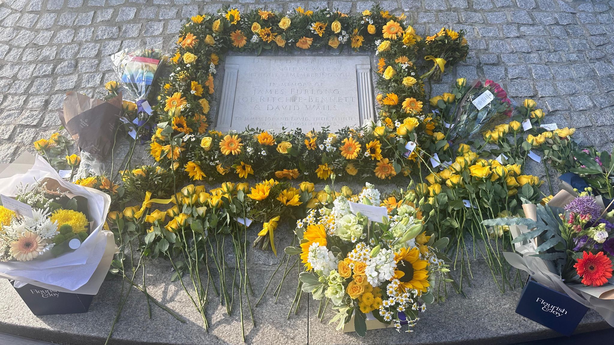 The memorial with flowers laid to mark the fourth year of the attack