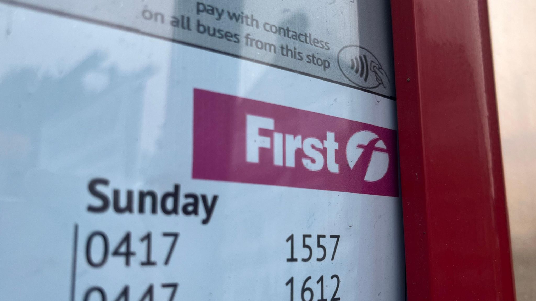 Close up of First Bus logo on a bus timetable