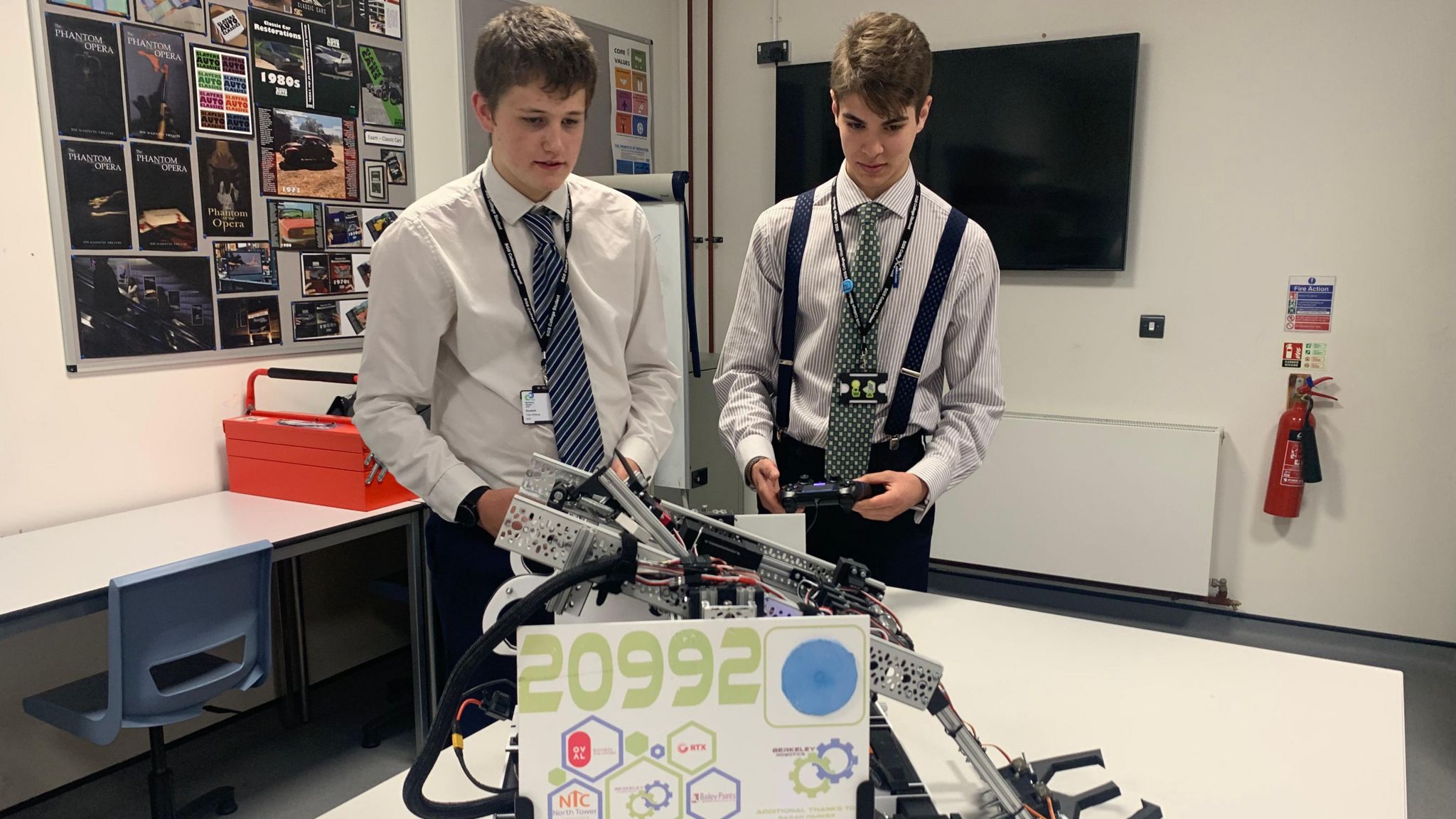 Two of the Berkeley Green UTC team mates show the BBC how the robot works