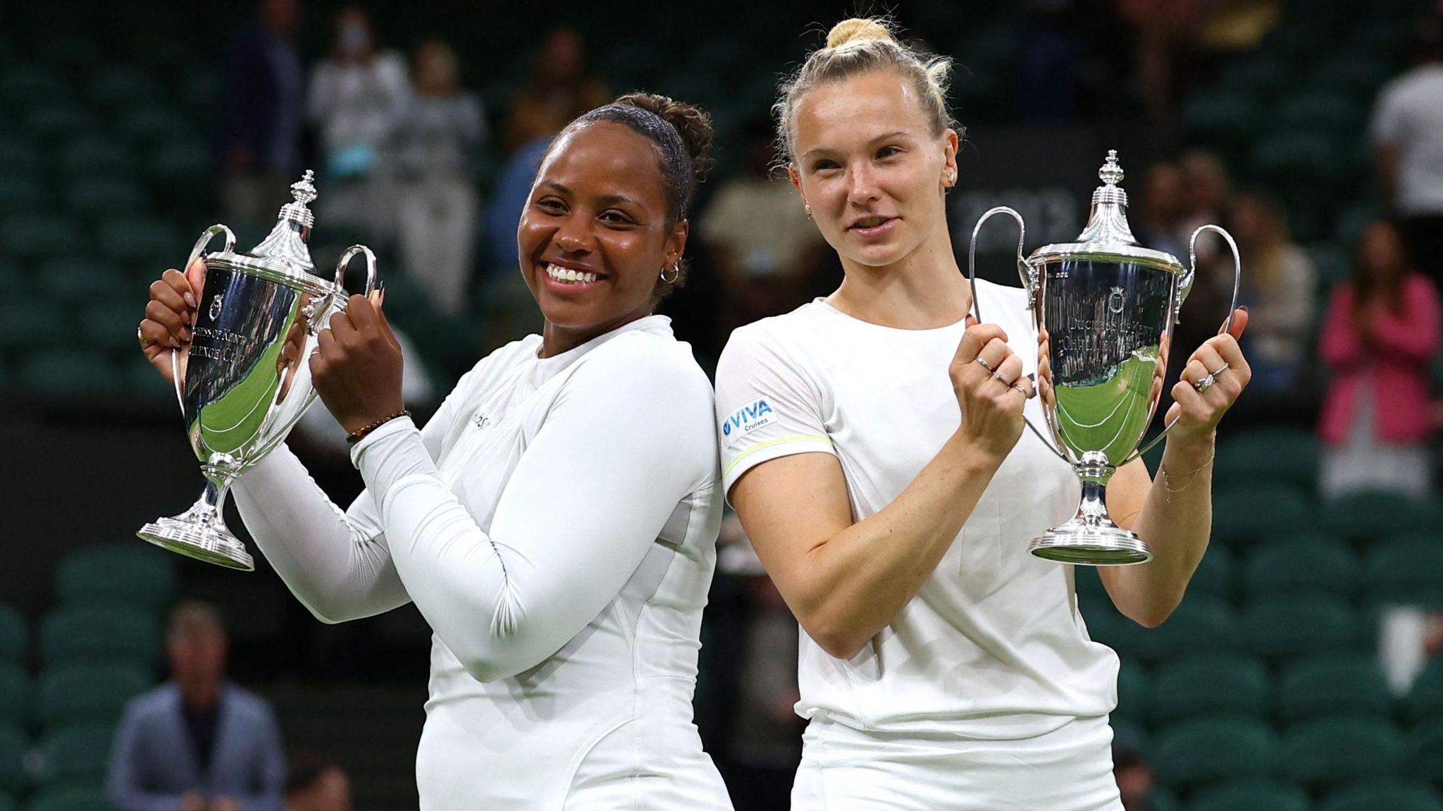 Taylor Townsend and Katerina Siniakova with their trophies