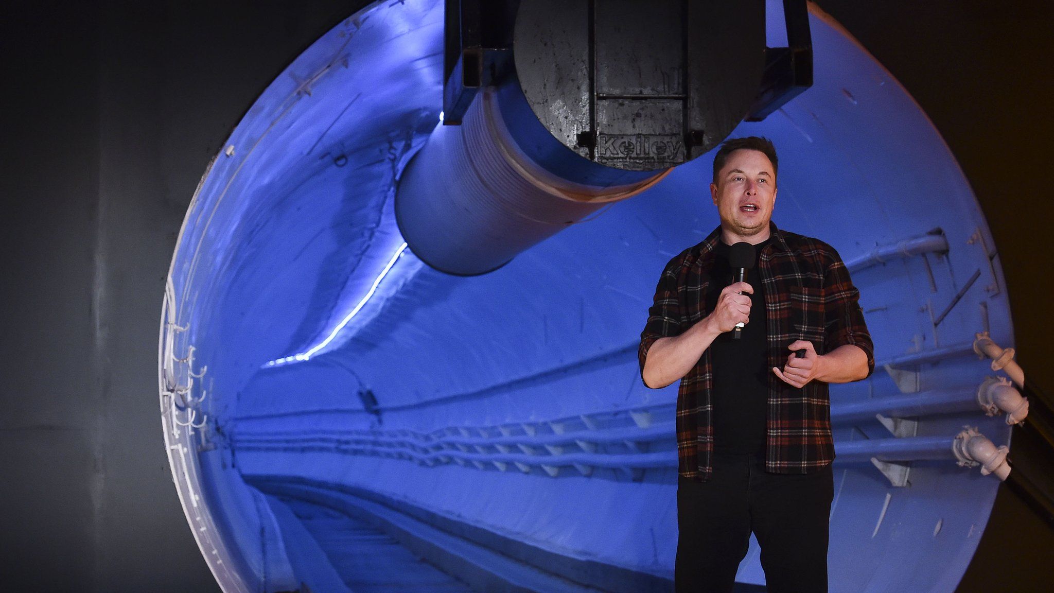 Elon Musk unveils test tunnel in Hawthorne, south of Los Angeles, California on December 18, 2018.