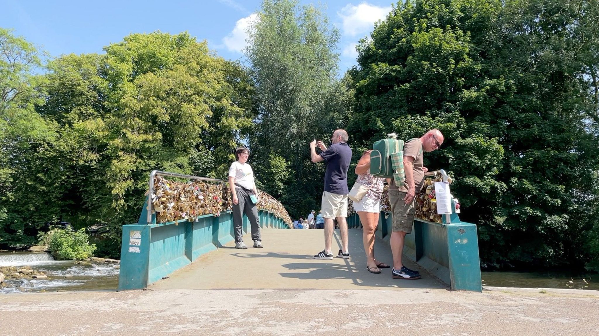 People standing on Weir Bridge