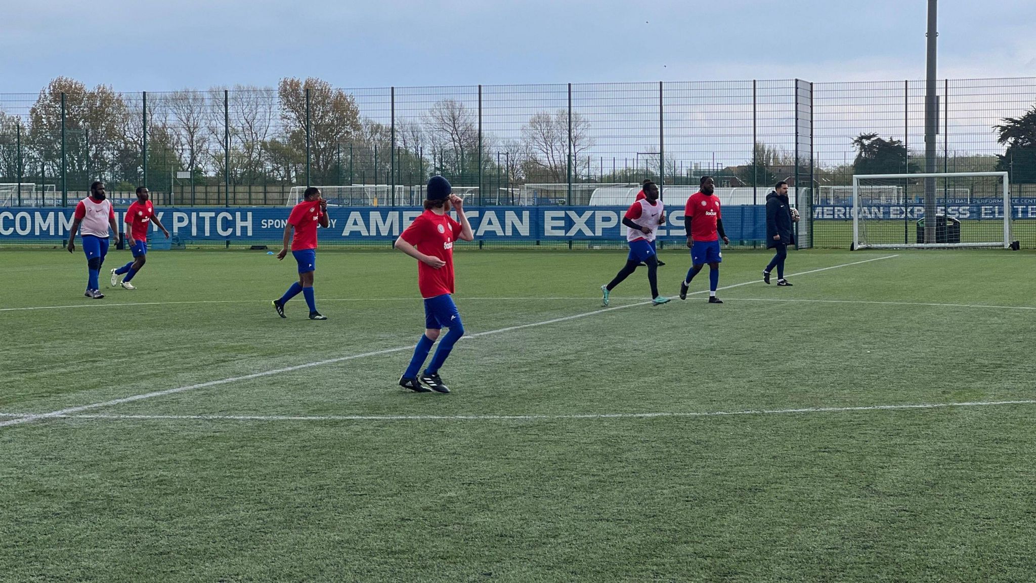 Street Soccer Academy players training at the Amex Stadium