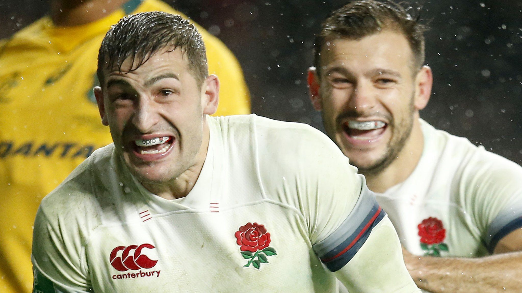 Jonny May celebrates scoring England's third try with creator Danny Care