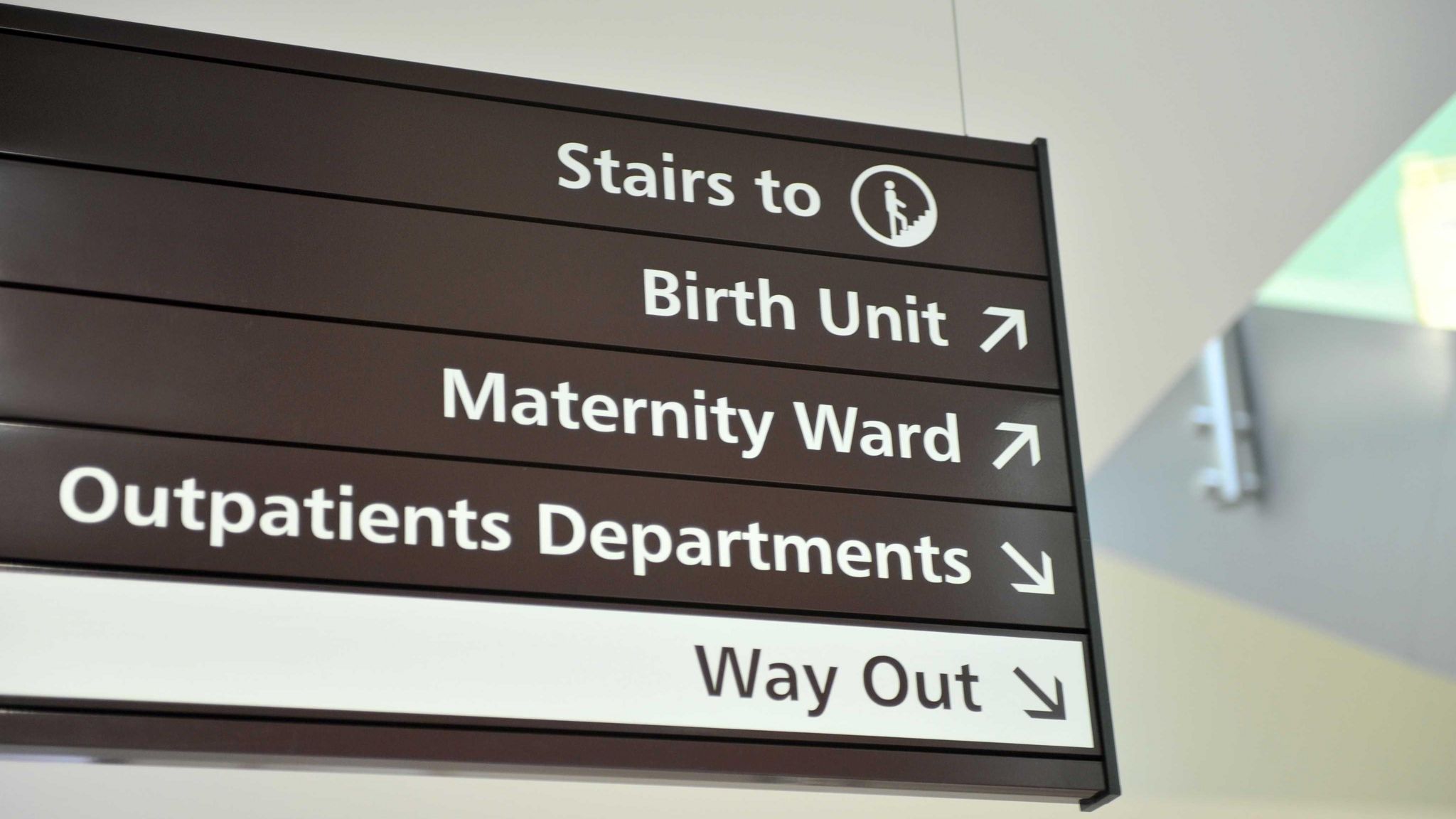 A sign for the Birth Unit, Maternity Ward and Outpatients Department at the Women's Centre at the Royal Gloucestershire Hospital