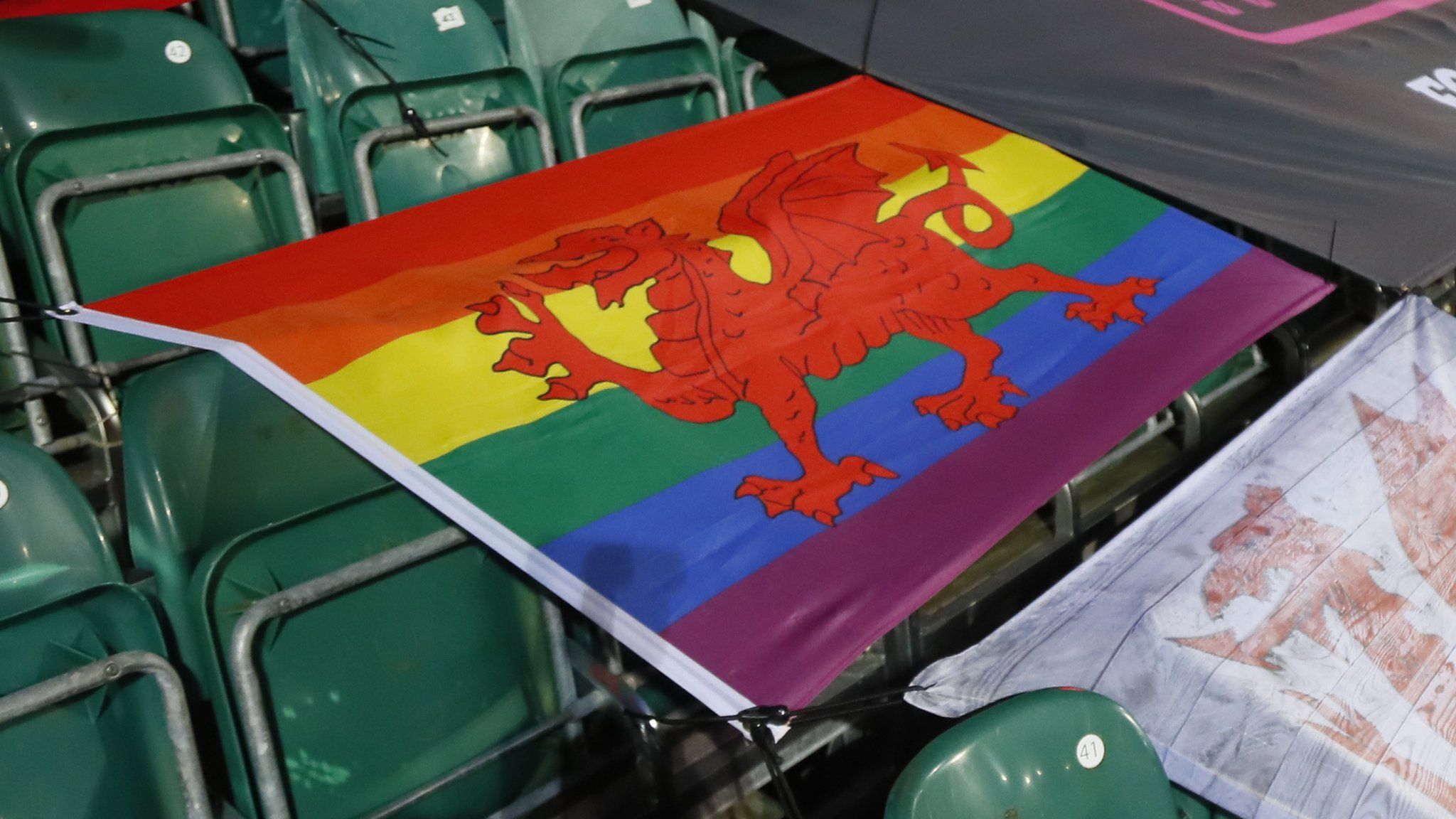 A Welsh flag with rainbow colours