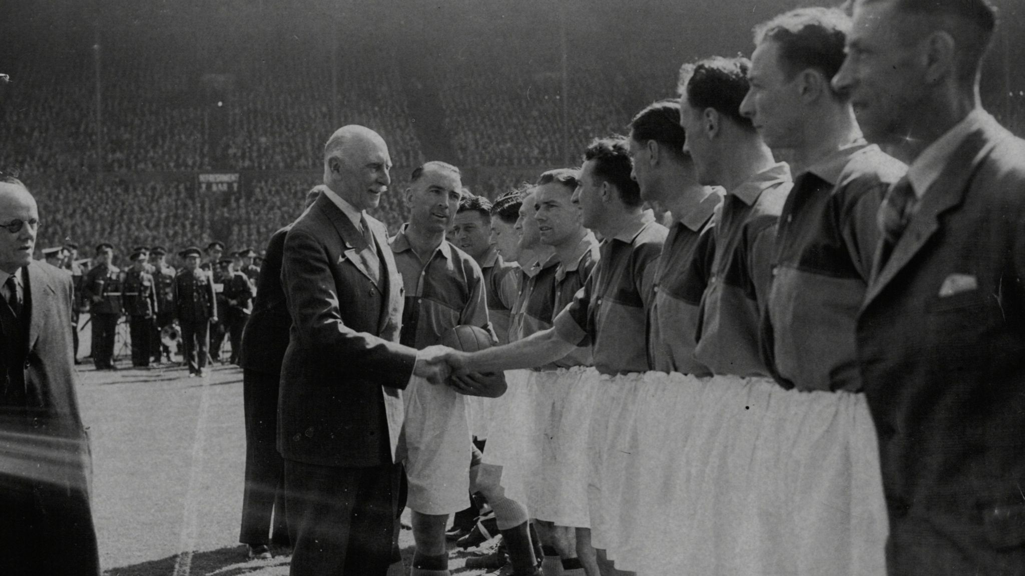 Football Association president The Earl Of Athlone shakes hands with Romford players ahead of the 1949 FA Amateur Cup final at Wembley