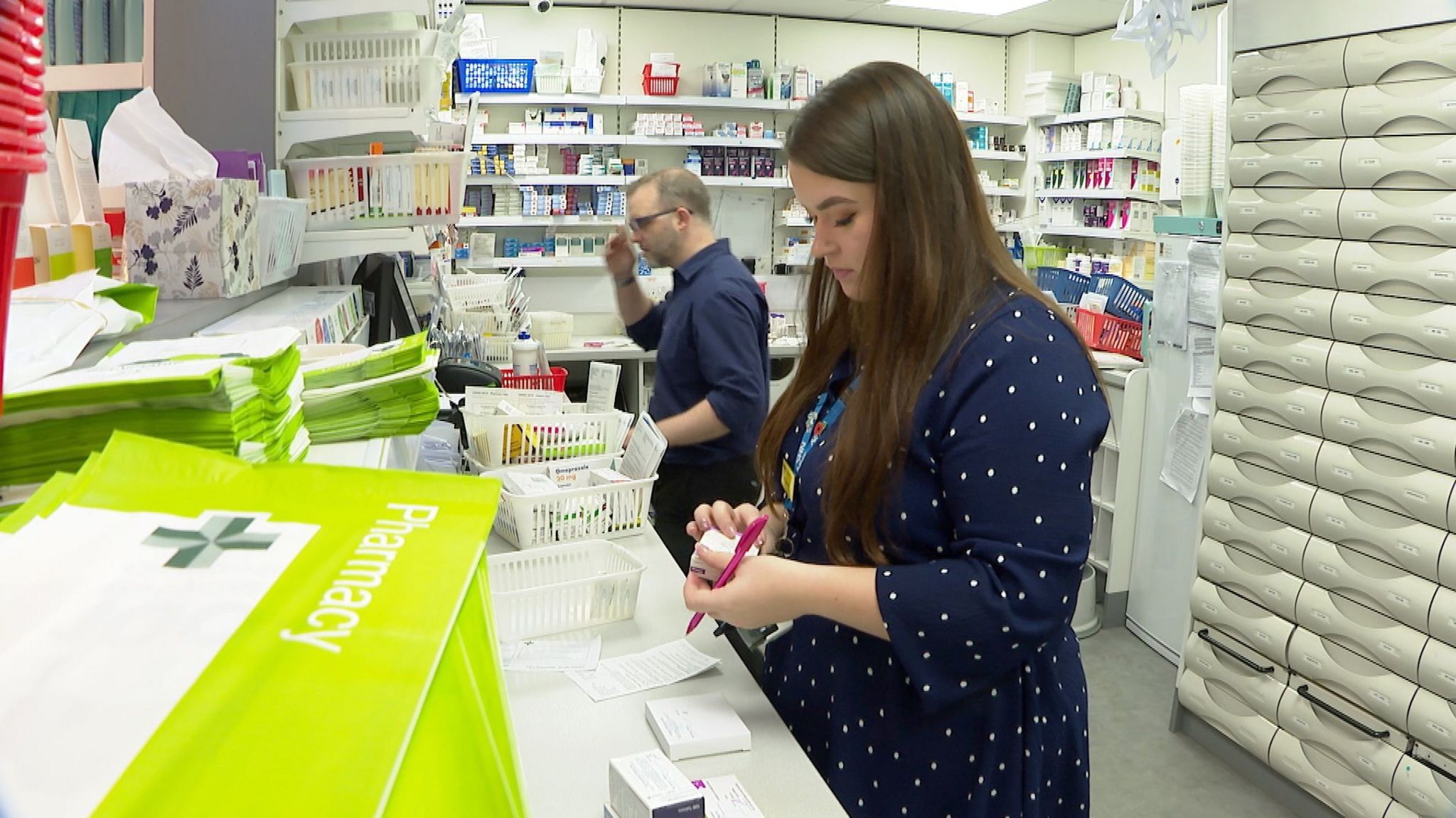 Pharmacist dispensing medicines