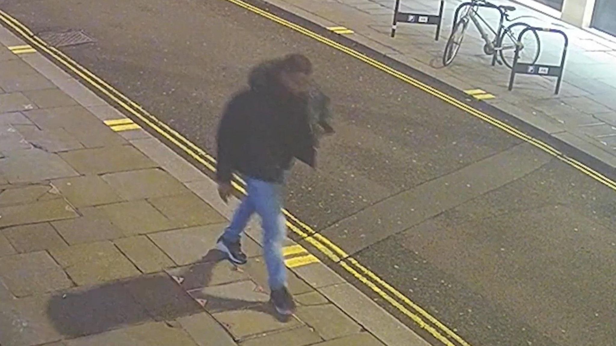 CCTV image issued by Metropolitan Police of a man detectives want to speak to in connection with their investigation of reports of a rape in central London. He is described as a fair-skinned black man with short hair and freckles.