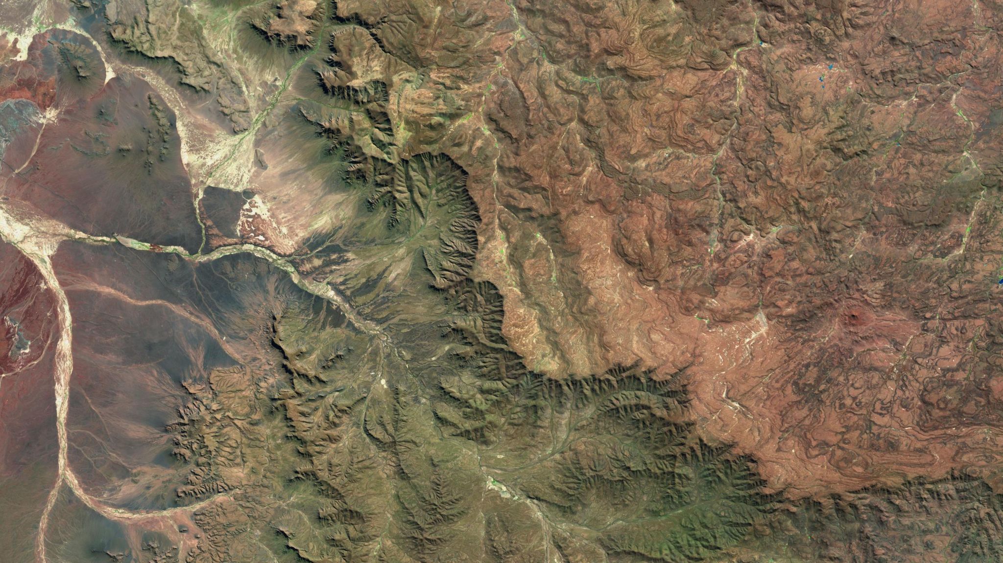 A satellite image of the Great Escarpment in southern Africa. A vague line can be seen in the land across the middle of the image.