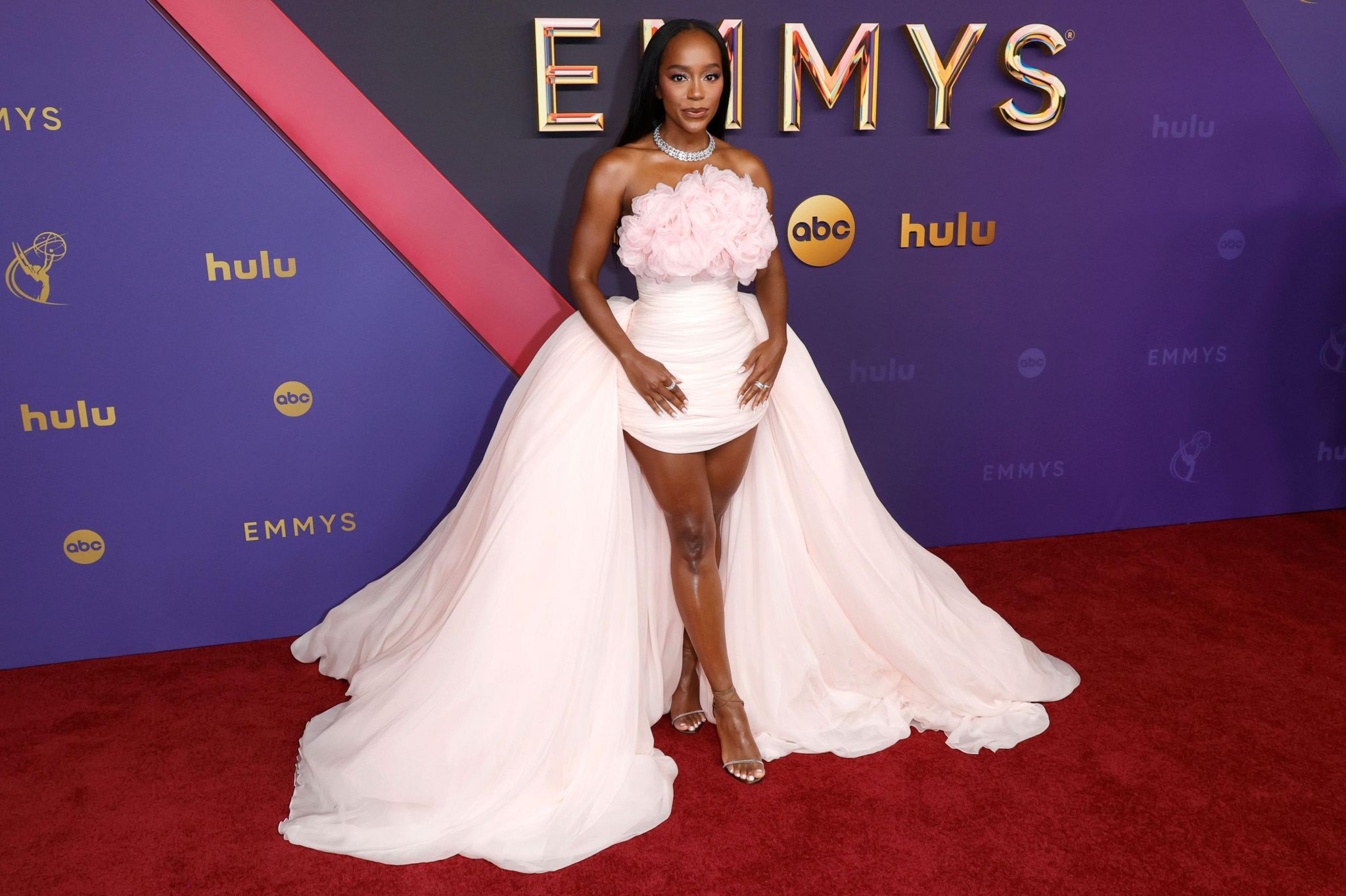 Aja Naomi King attends the 76th Primetime Emmy Awards at Peacock Theater on September 15, 2024 in Los Angeles, California