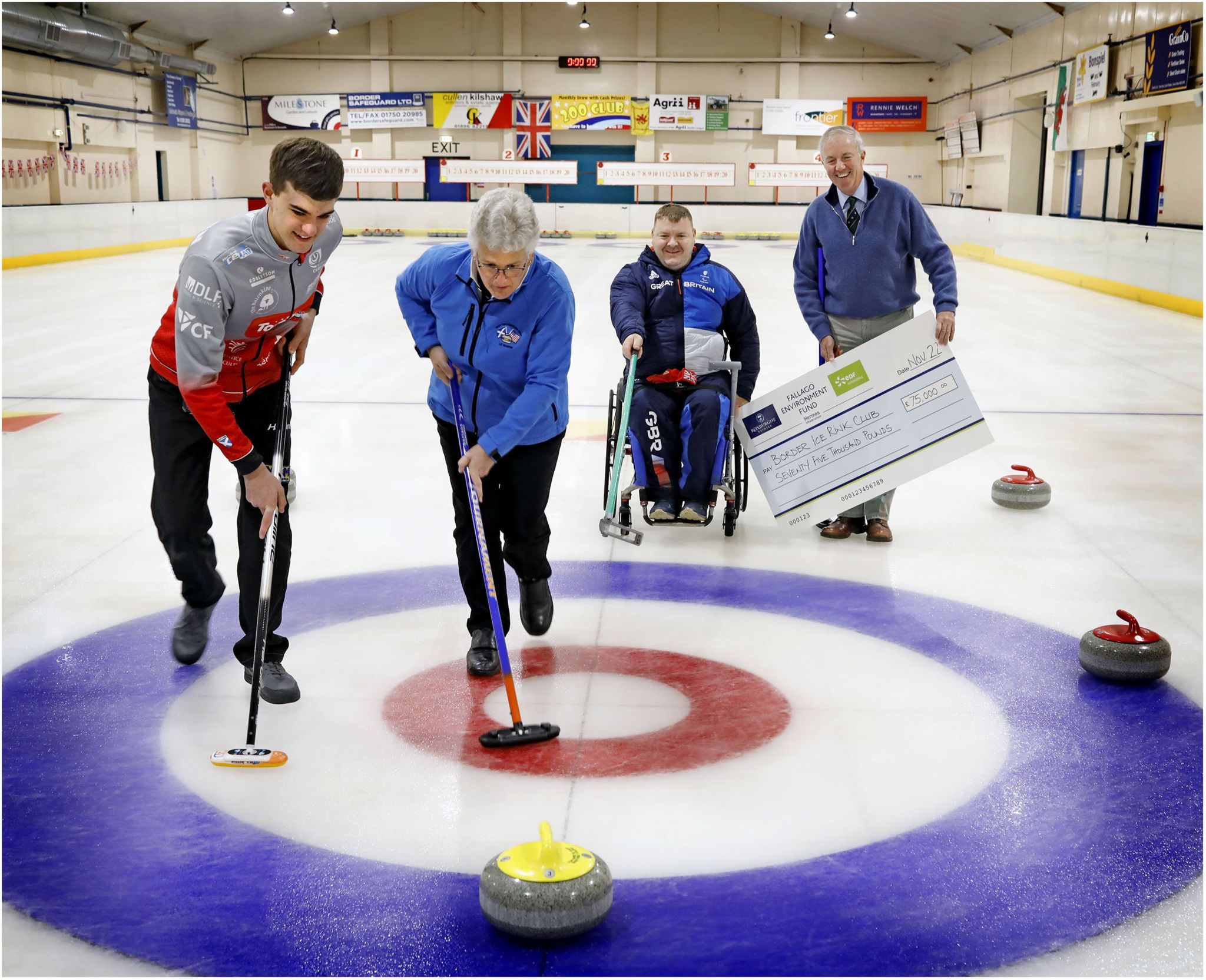 Curlers Callum McLain, Liz Martin and David Melrose with Fallago Environment Fund chair Gareth Baird