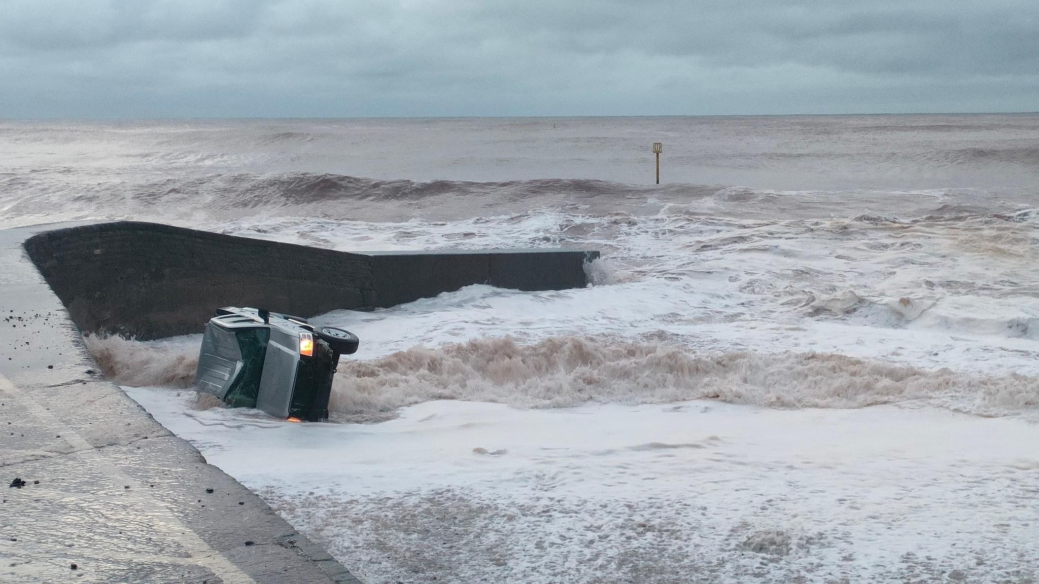 Car driven out to sea by storm